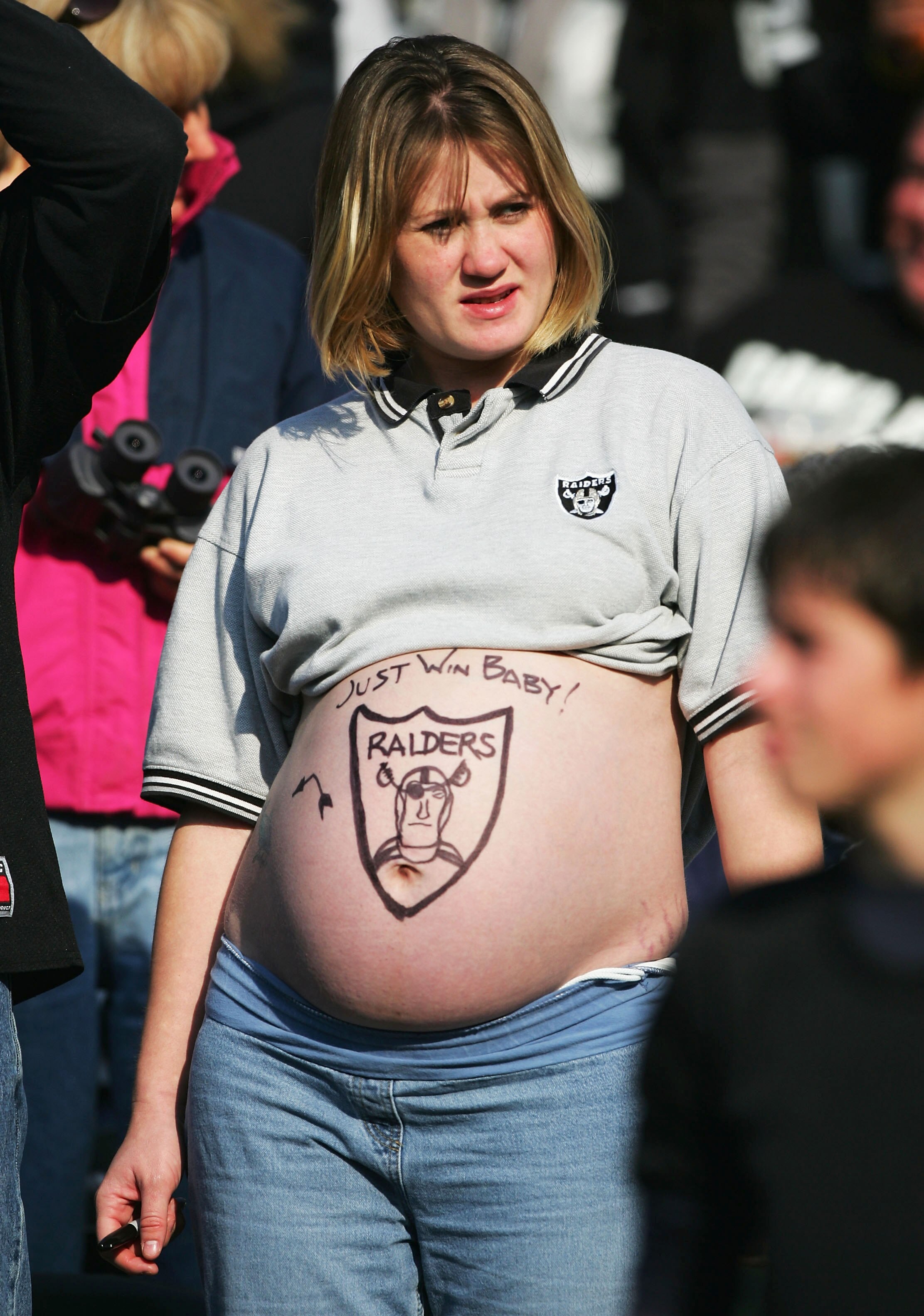 OAKLAND, CA - DECEMBER 5:  A devoted Raiders fan looks on during the game between the Oakland Raiders and the Kansas City Chiefs at Network Associates Coliseum on December 5, 2004 in Oakland, California.  (Photo by Jed Jacobsohn/Getty Images)
