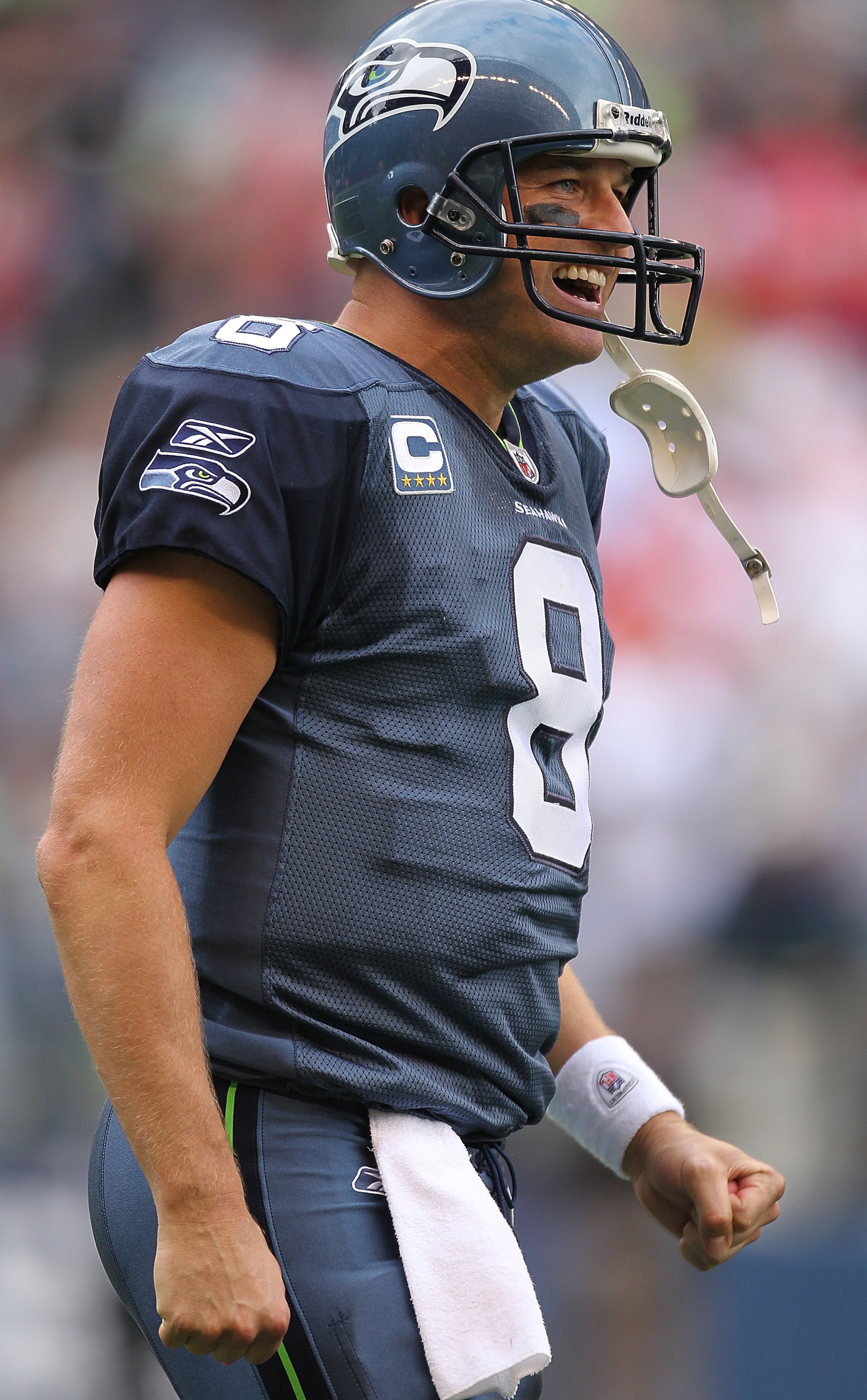 SEATTLE - SEPTEMBER 12: Quarterback Matt Hasselbeck #8 of the Seattle Seahawks celebrates a leaping catch by John Carlson #89 during the NFL season opener against the San Francisco 49ers at Qwest Field on September 12, 2010 in Seattle, Washington. The Se SEATTLE - SEPTEMBER 12: Quarterback Matt Hasselbeck #8 of the Seattle Seahawks celebrates a leaping catch by John Carlson #89 during the NFL season opener against the San Francisco 49ers at Qwest Field on September 12, 2010 in Seattle, Washington. The Se