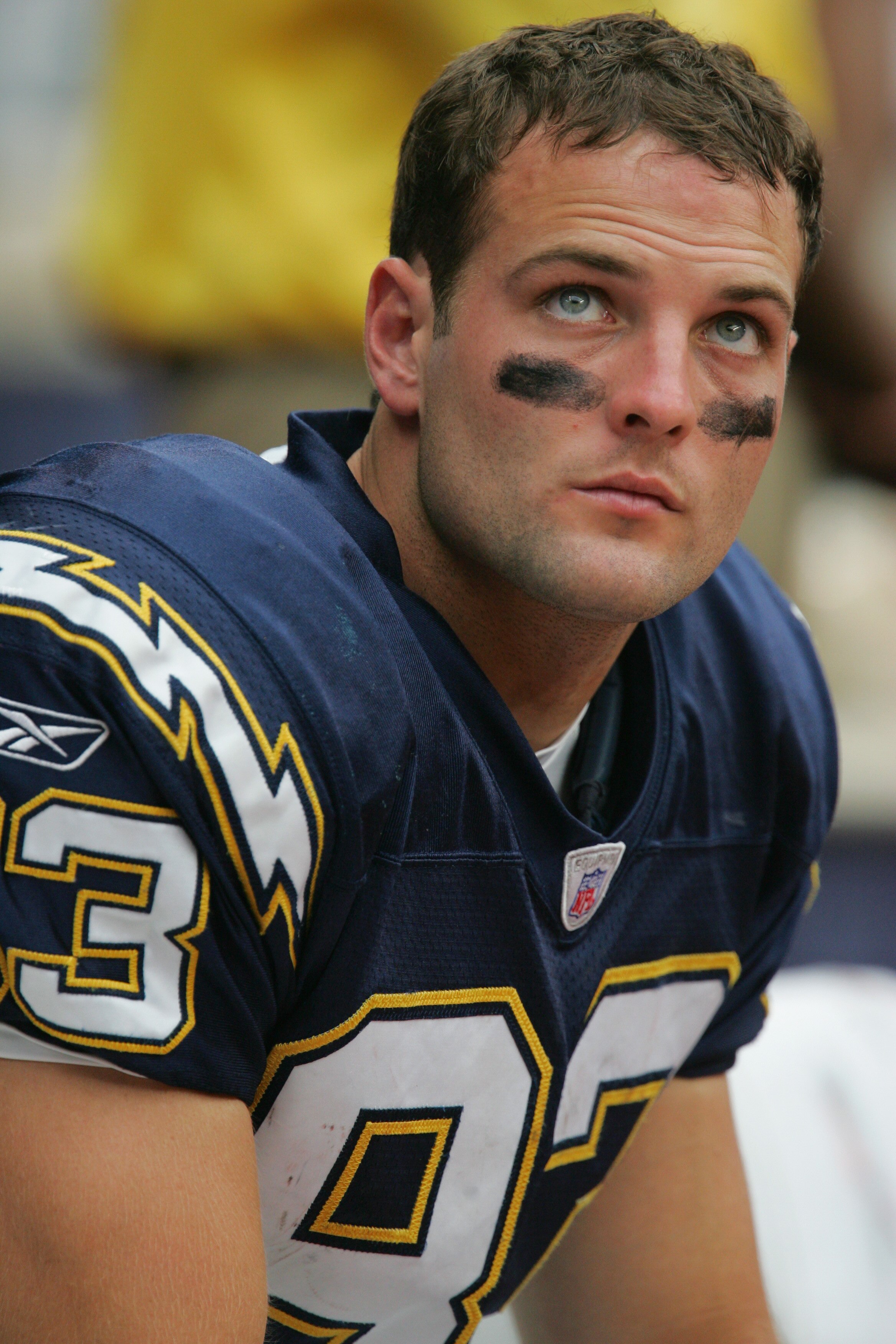 HOUSTON - SEPTEMBER 12: Wes Welker #83 of the San Diego Chargers sits on the sidelines during the game against the Houston Texans on September 12, 2004 at Reliant Stadium in Houston, Texas. The Chargers won 27-20.  (Photo by Ronald Martinez/Getty Images)