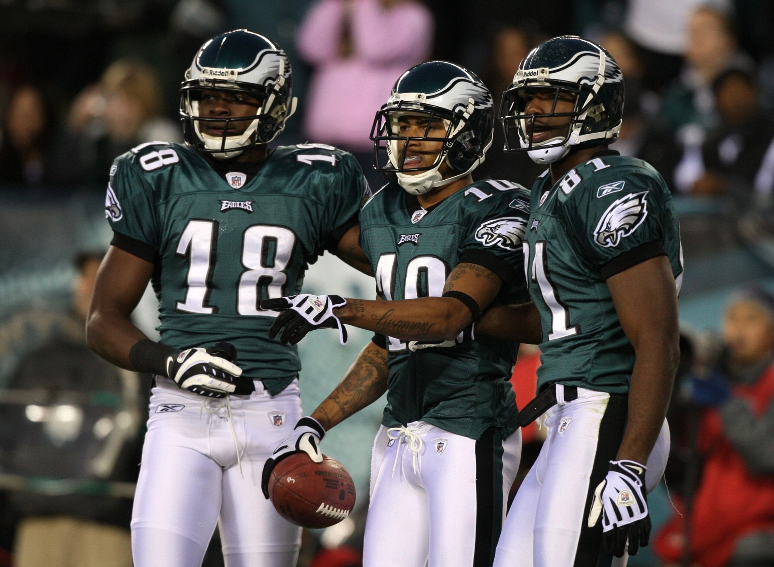 PHILADELPHIA - DECEMBER 27 :  DeSean Jackson #10 of the Philadelphia Eagles celebrates with teammates Jeremy Maclin #18 and Jason Avant #81 after scoring a touchdown in the first quarter againt the Denver Broncos at Lincoln Financial Field on December 27,