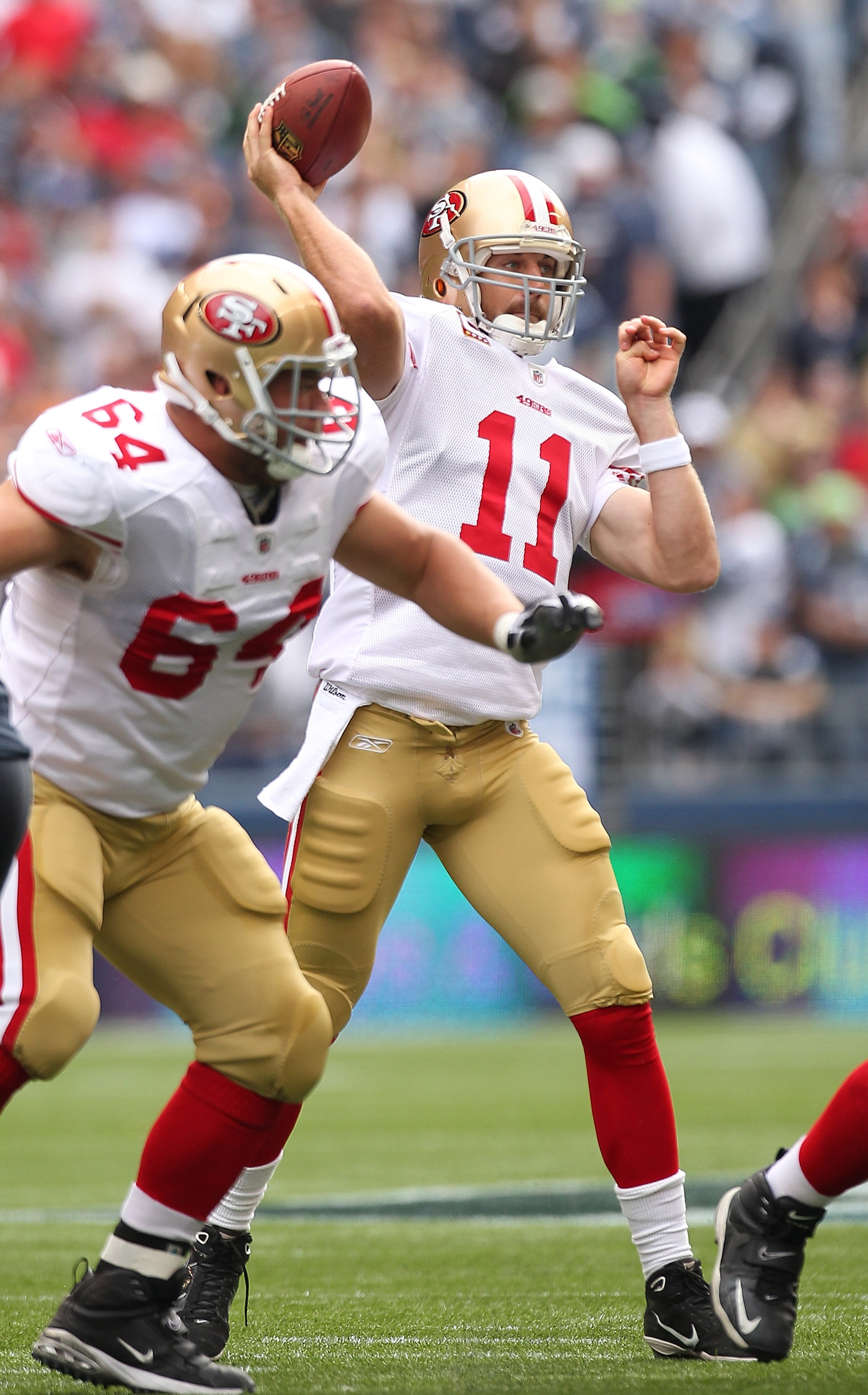 SEATTLE - SEPTEMBER 12: Quarterback Alex Smith #11 of the San Francisco 49ers passes during the NFL season opener against the Seattle Seahawks at Qwest Field on September 12, 2010 in Seattle, Washington. The Seahawks defeated the 49ers 31-6. (Photo by Ot SEATTLE - SEPTEMBER 12: Quarterback Alex Smith #11 of the San Francisco 49ers passes during the NFL season opener against the Seattle Seahawks at Qwest Field on September 12, 2010 in Seattle, Washington. The Seahawks defeated the 49ers 31-6. (Photo by Ot