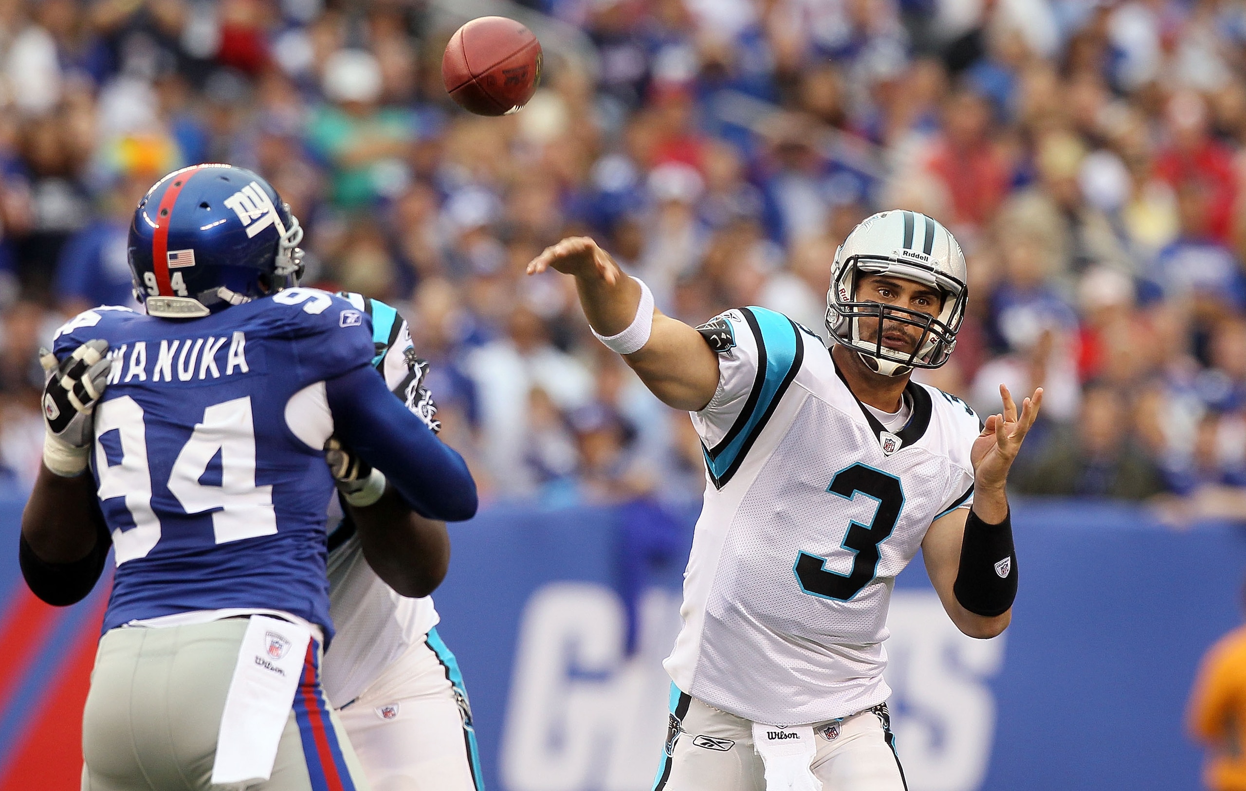EAST RUTHERFORD, NJ - SEPTEMBER 12:  Matt Moore #3 of the Carolina Panthers throws a pass against the New York Giants on September 12, 2010 at the New Meadowlands Stadium in East Rutherford, New Jersey.  (Photo by Jim McIsaac/Getty Images)