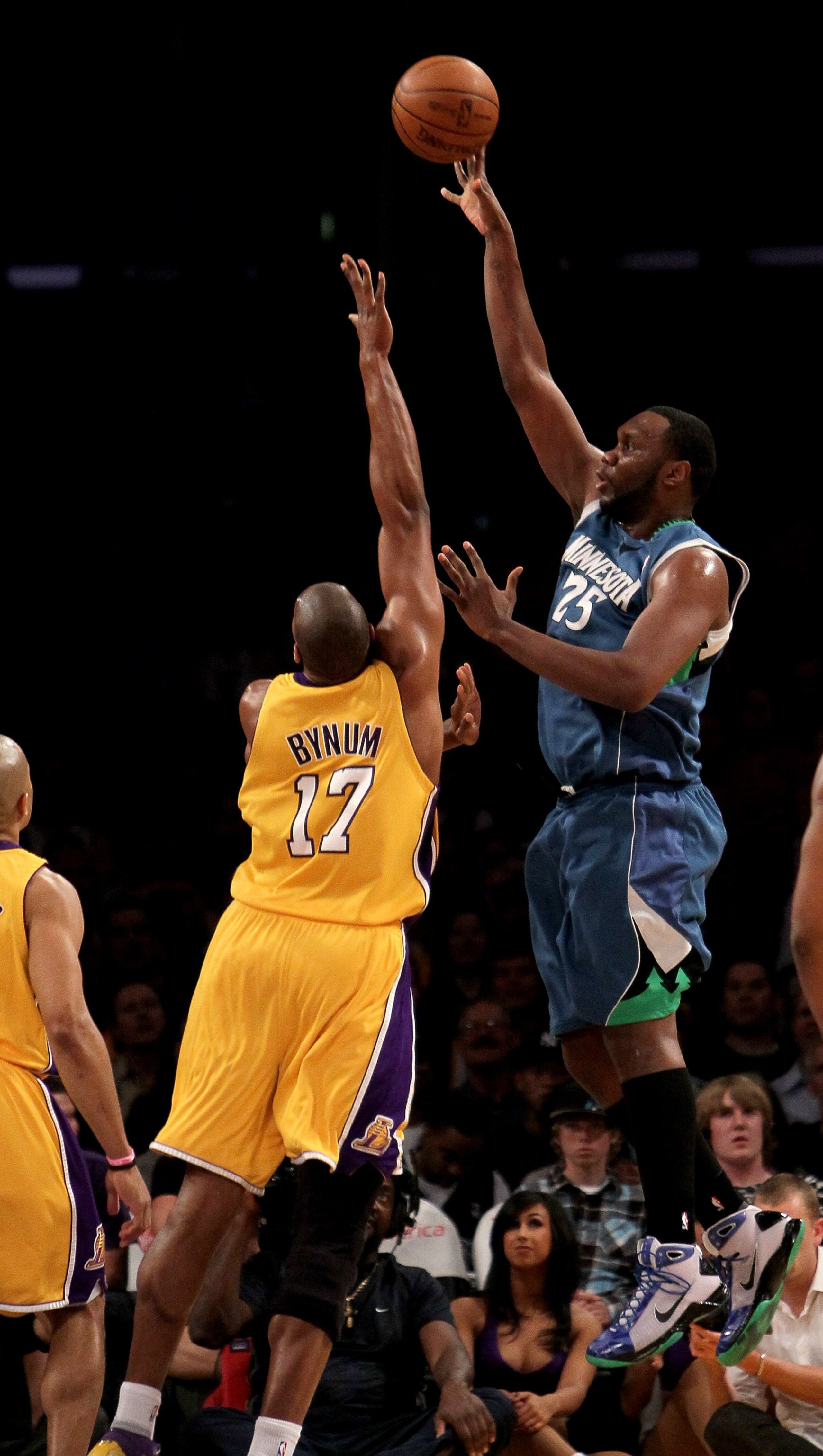 LOS ANGELES - MARCH 19:   Al Jefferson #25 of the Minnesota Timberwolves shoots over Andrew Bynum #17 of the Los Angeles Lakers on March 19, 2010 at Staples Center in Los Angeles, California.  NOTE TO USER: User expressly acknowledges and agrees that, by