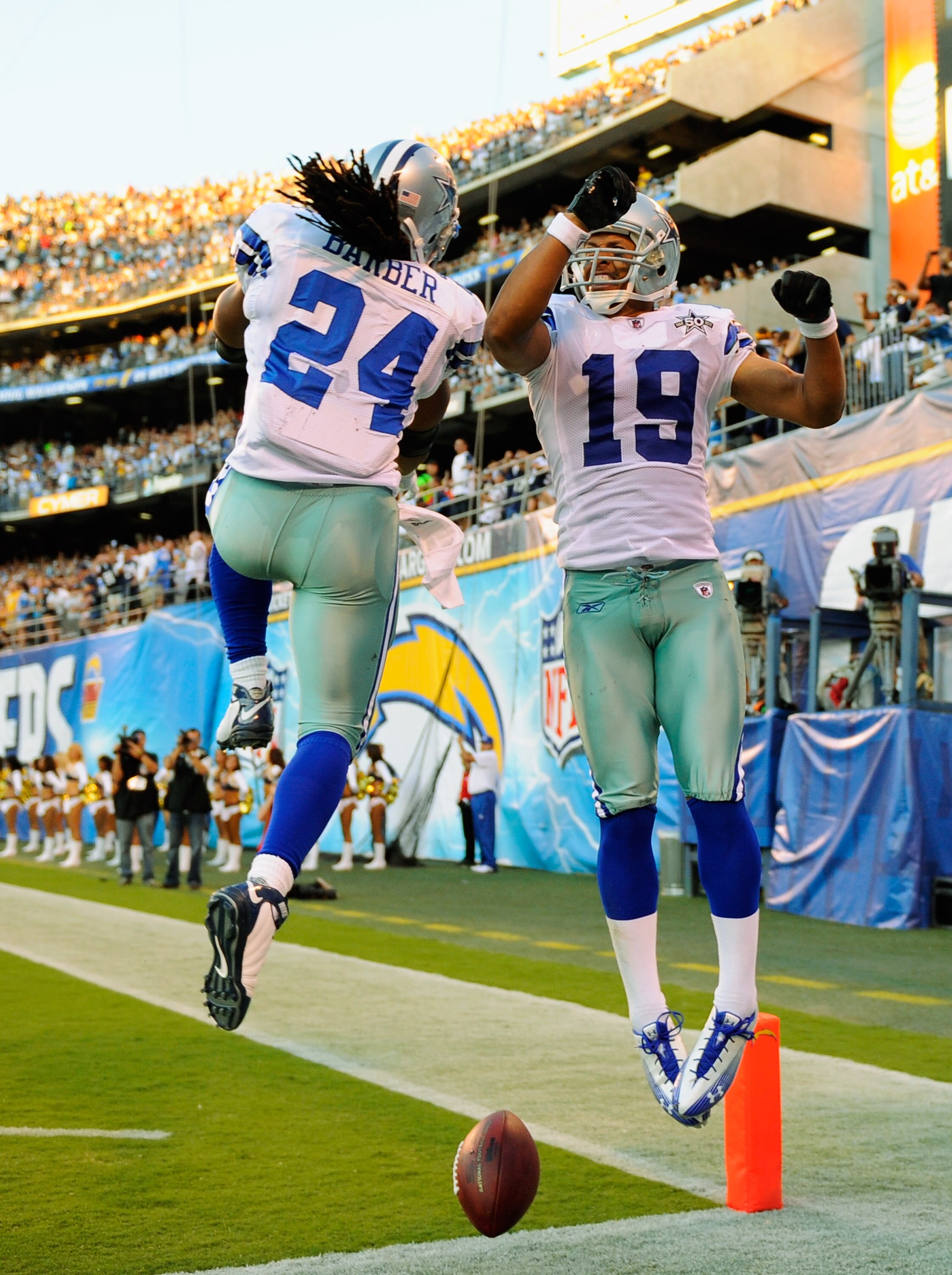 SAN DIEGO - AUGUST 21:  Wide receiver Miles Austin #19 of the Dallas Cowboys celebrates with teammate Marion Barber #24 after scoring a touchdown the San Diego Chargers during their pre-season NFL football game at Qualcomm Stadium on August 21, 2010 in Sa