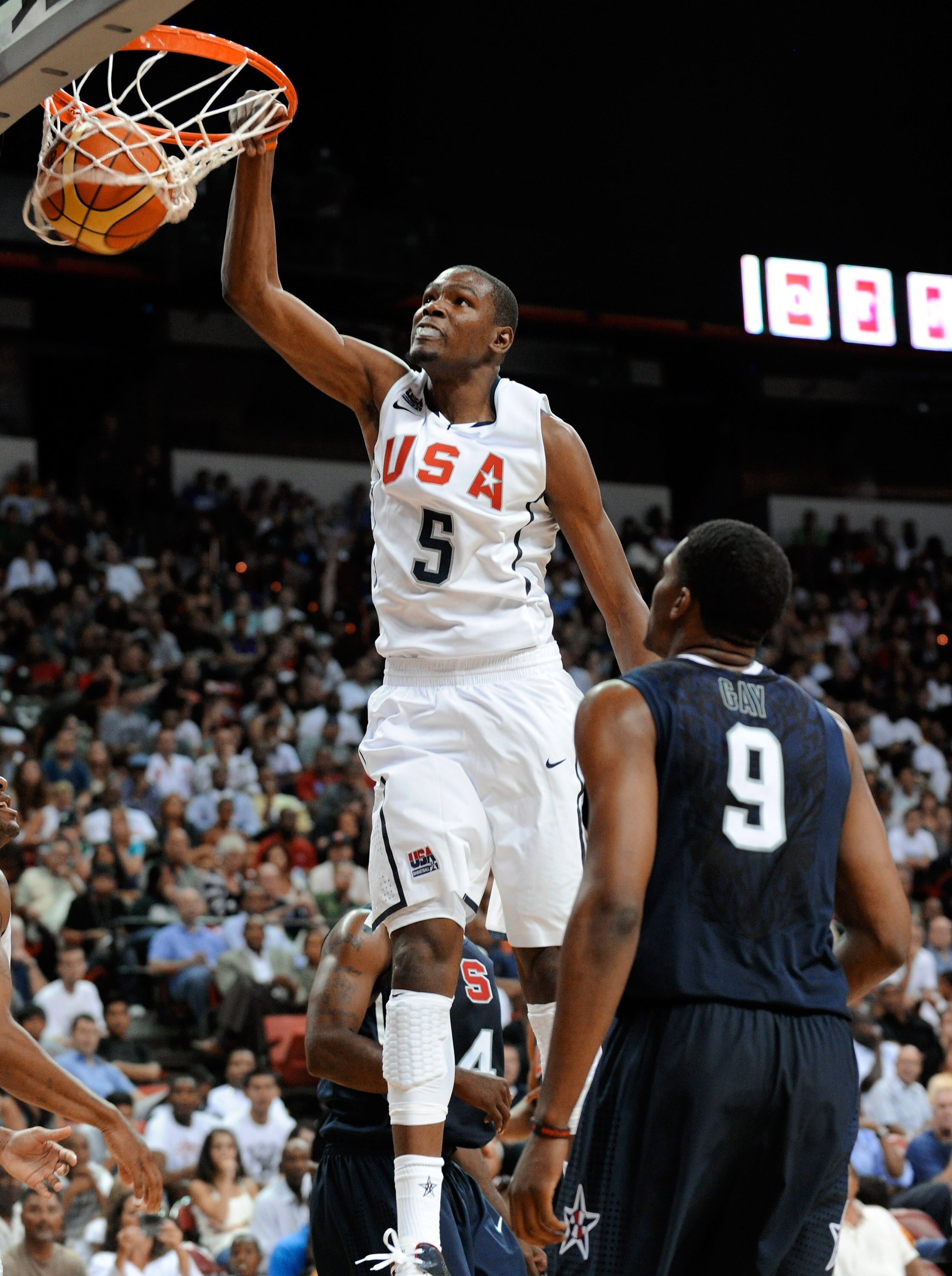 LAS VEGAS - JULY 24:  Kevin Durant #5 of the 2010 USA Basketball Men's National Team dunks over Rudy Gay #9 of the 2010 USA Basketball Men's National Team during a USA Basketball showcase at the Thomas & Mack Center on July 24, 2010 in Las Vegas, Nevada.