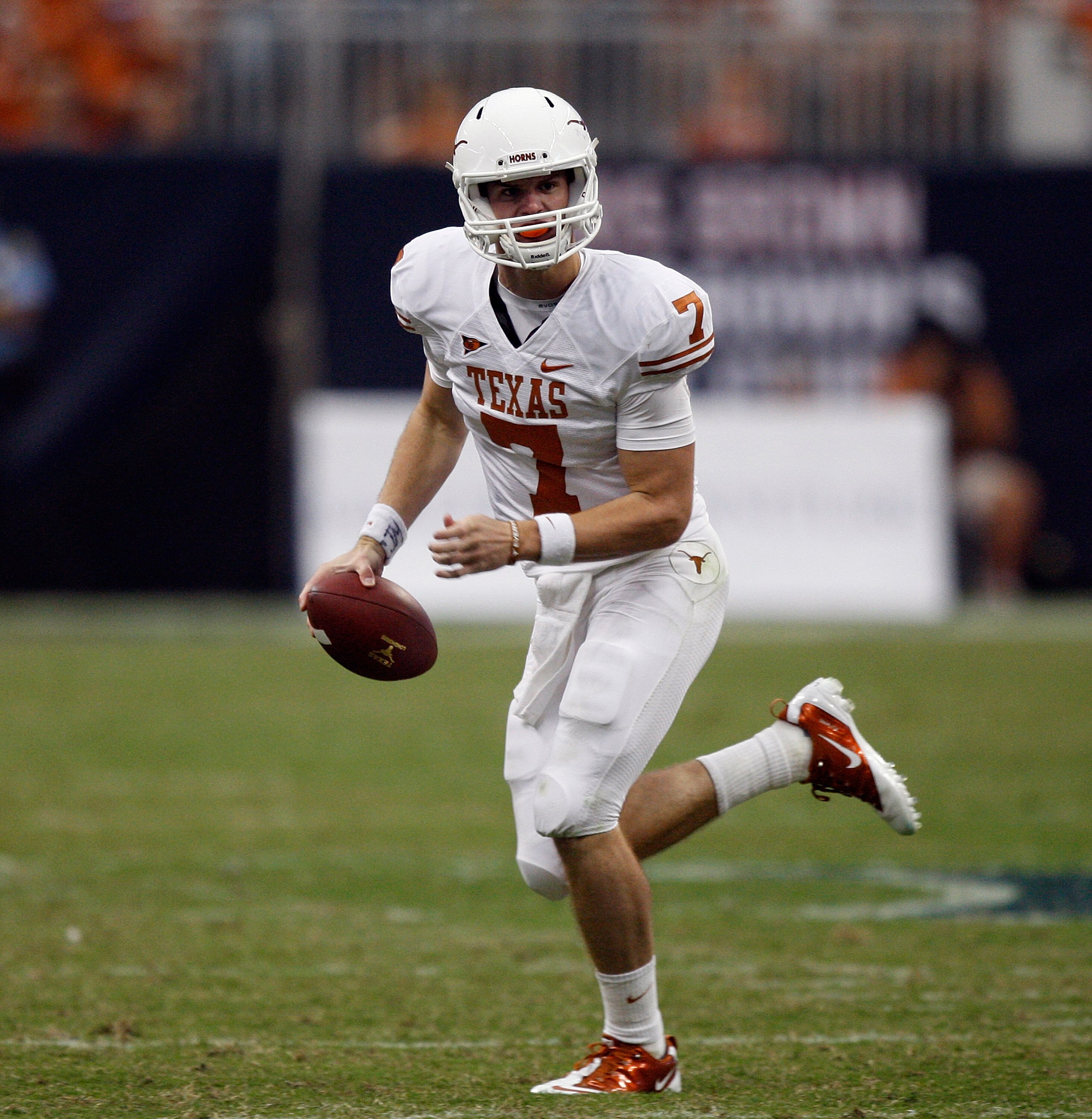 HOUSTON - SEPTEMBER 04:  Quarterback Garrett Gilbert #7 of the Texas Longhorns during game action against the Rice Owls at Reliant Stadium on September 4, 2010 in Houston, Texas. Texas won 34-17.  (Photo by Bob Levey/Getty Images)