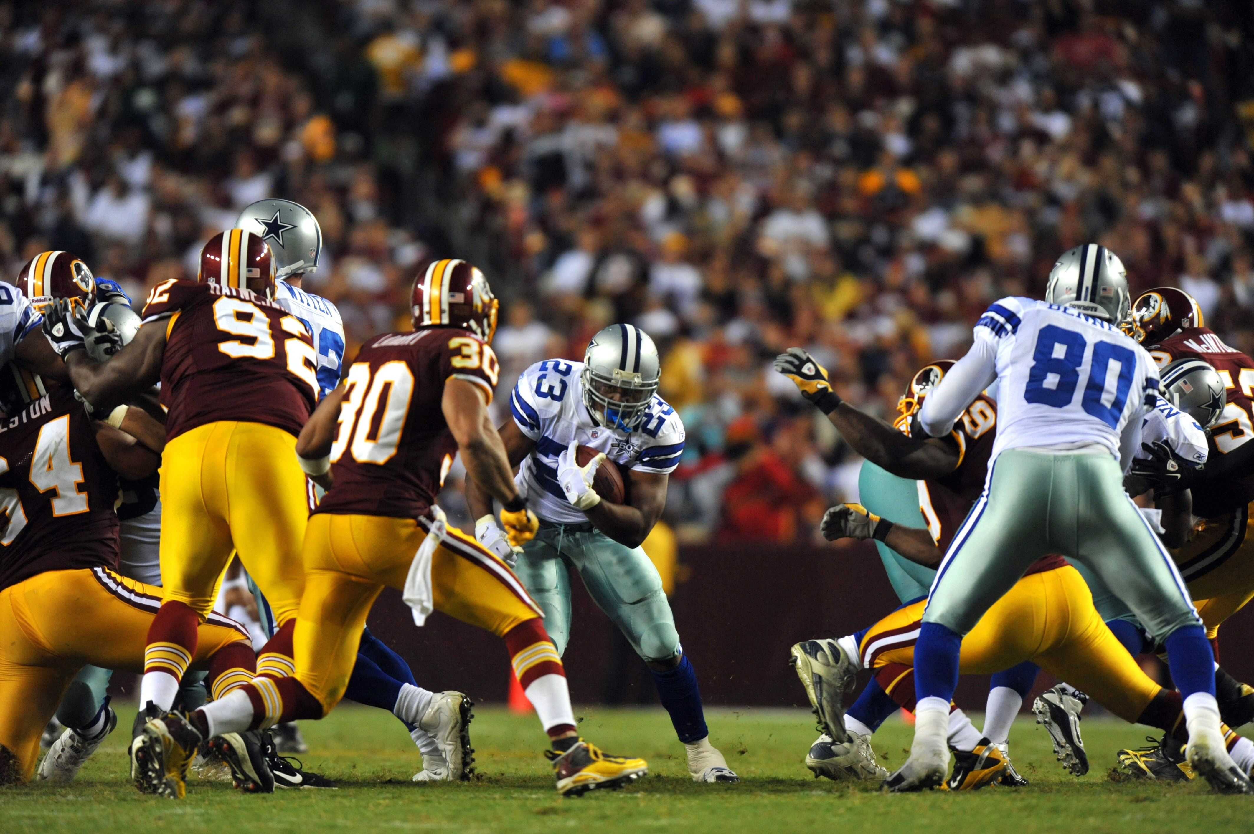 LANDOVER - SEPTEMBER 12:  Tashard Choice #23 of the Dallas Cowboys runs the ball during the NFL season opener against the Washington Redskins at FedExField on September 12, 2010 in Landover, Maryland. The Redskins defeated the Cowboys 13-7. (Photo by Larr