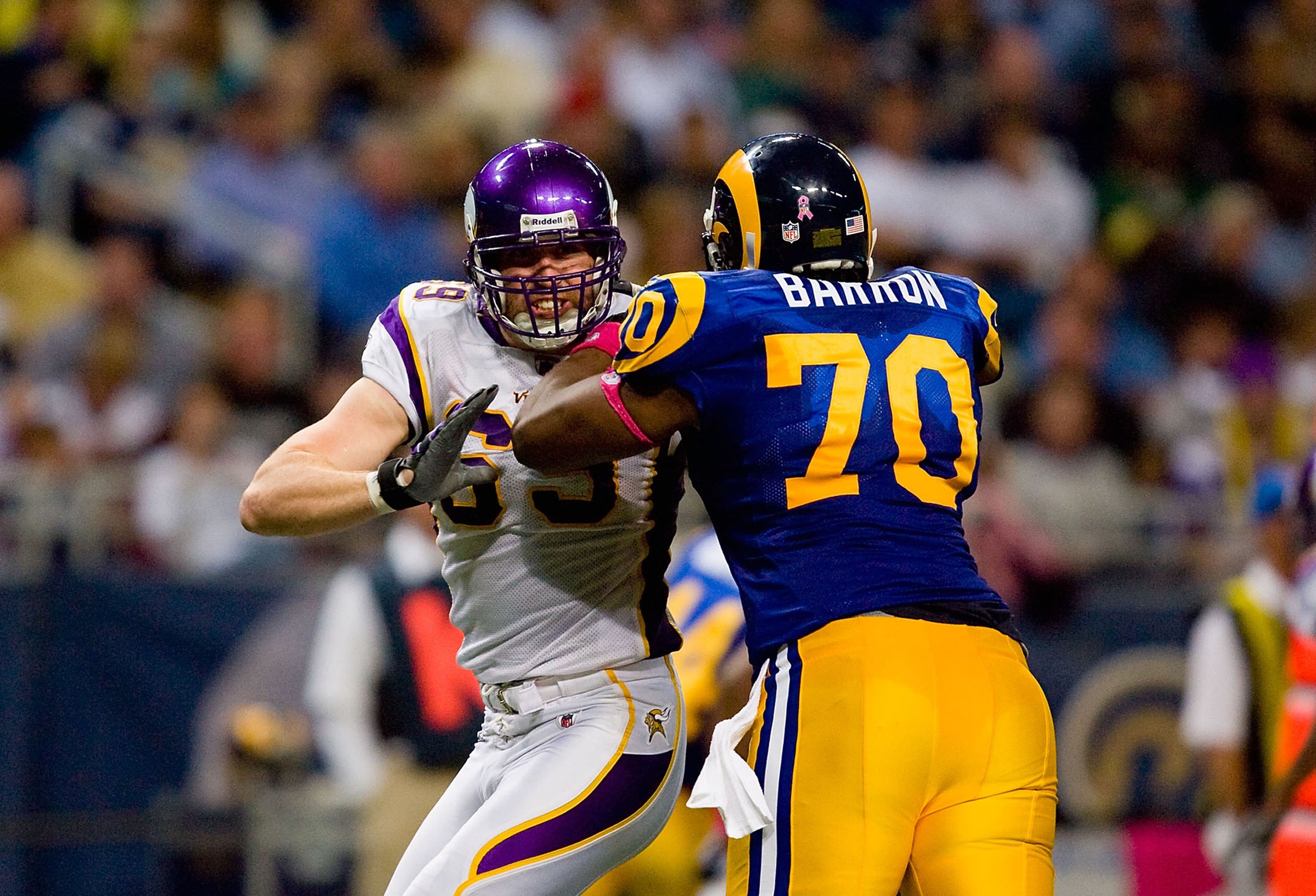 ST. LOUIS - OCTOBER 11:  Jared Allen #69 of the Minnesota Vikings engages Alex Barron #70 of the St. Louis Rams in a block during their NFL game at the Edward Jones Dome on October 11, 2009 in St. Louis, Missouri. The Vikings defeated the Rams 38-10. (Pho