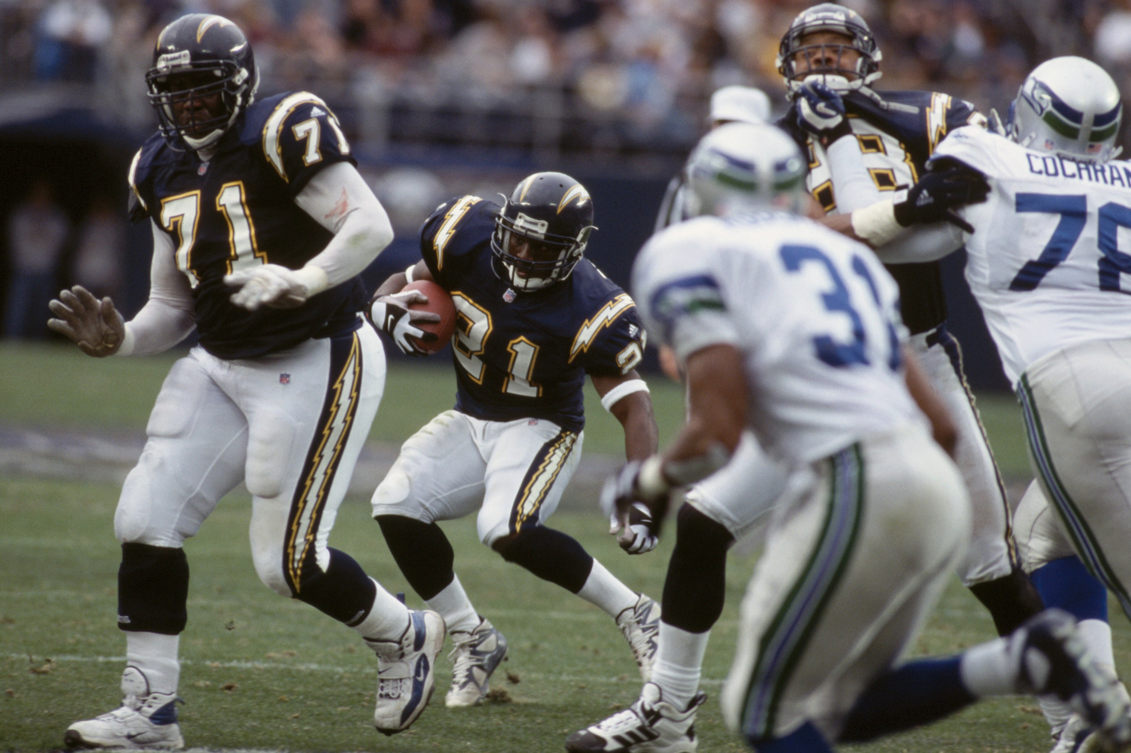 30 Dec 2001:  Running back LaDainian Tomlinson #21 of the San Diego Chargers runs with the ball during the NFL game against the Seattle Seahawks at Qualcomm Stadium in San Diego, California.  The Seahawks defeated the Chargers 25-22.  \ \ Mandatory Credit