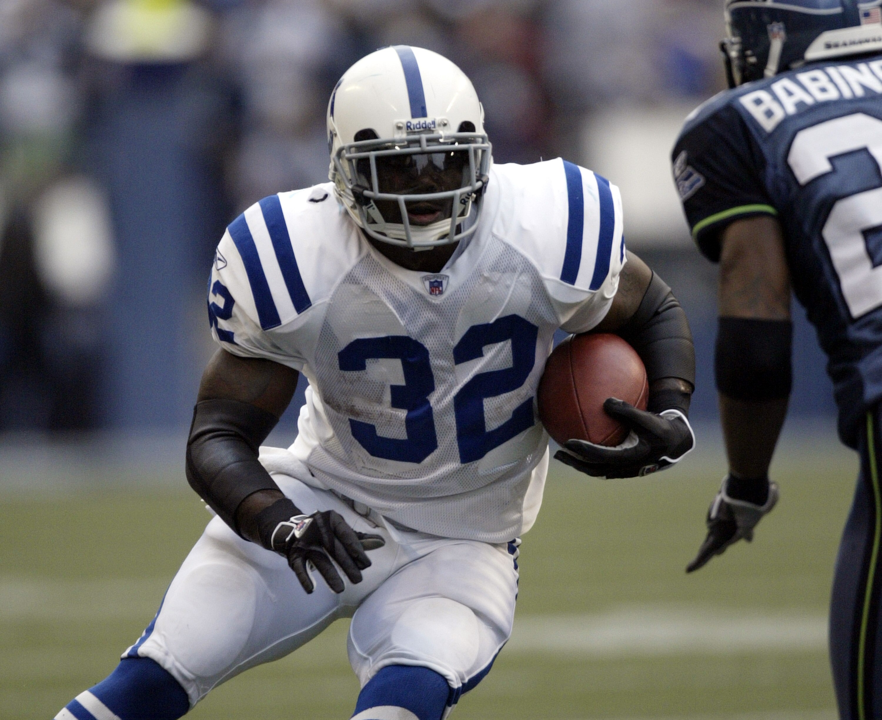 SEATTLE - DECEMBER 24:  Running back Edgerrin James #32 of the Indianapolis Colts rushes against the Seattle Seahawks at Qwest Field on December 24, 2005 in Seattle, Washington. The Seahawks defeated the Colts 28-13.  (Photo by Otto Greule Jr/Getty Images