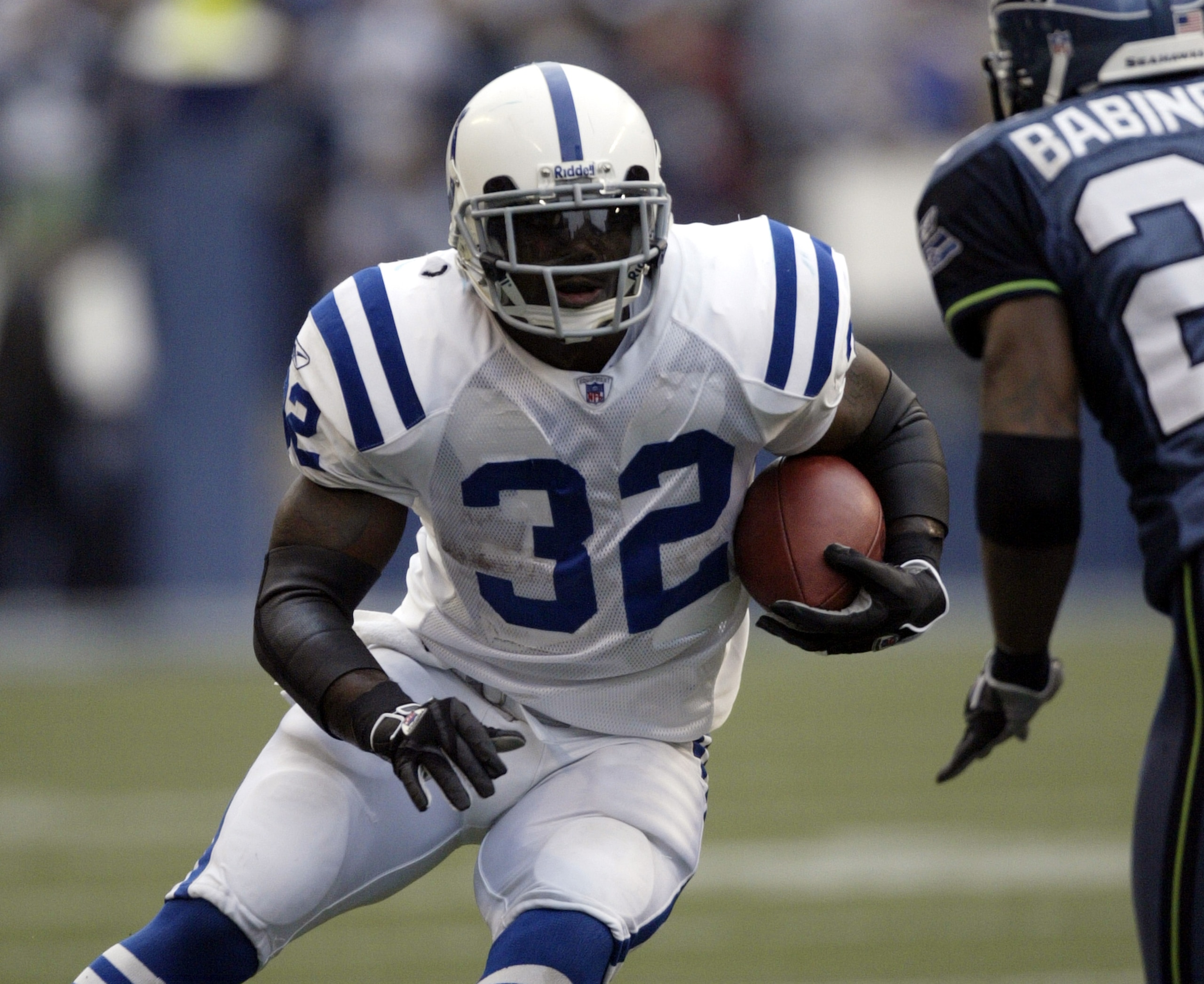 SEATTLE - DECEMBER 24:  Running back Edgerrin James #32 of the Indianapolis Colts rushes against the Seattle Seahawks at Qwest Field on December 24, 2005 in Seattle, Washington. The Seahawks defeated the Colts 28-13.  (Photo by Otto Greule Jr/Getty Images
