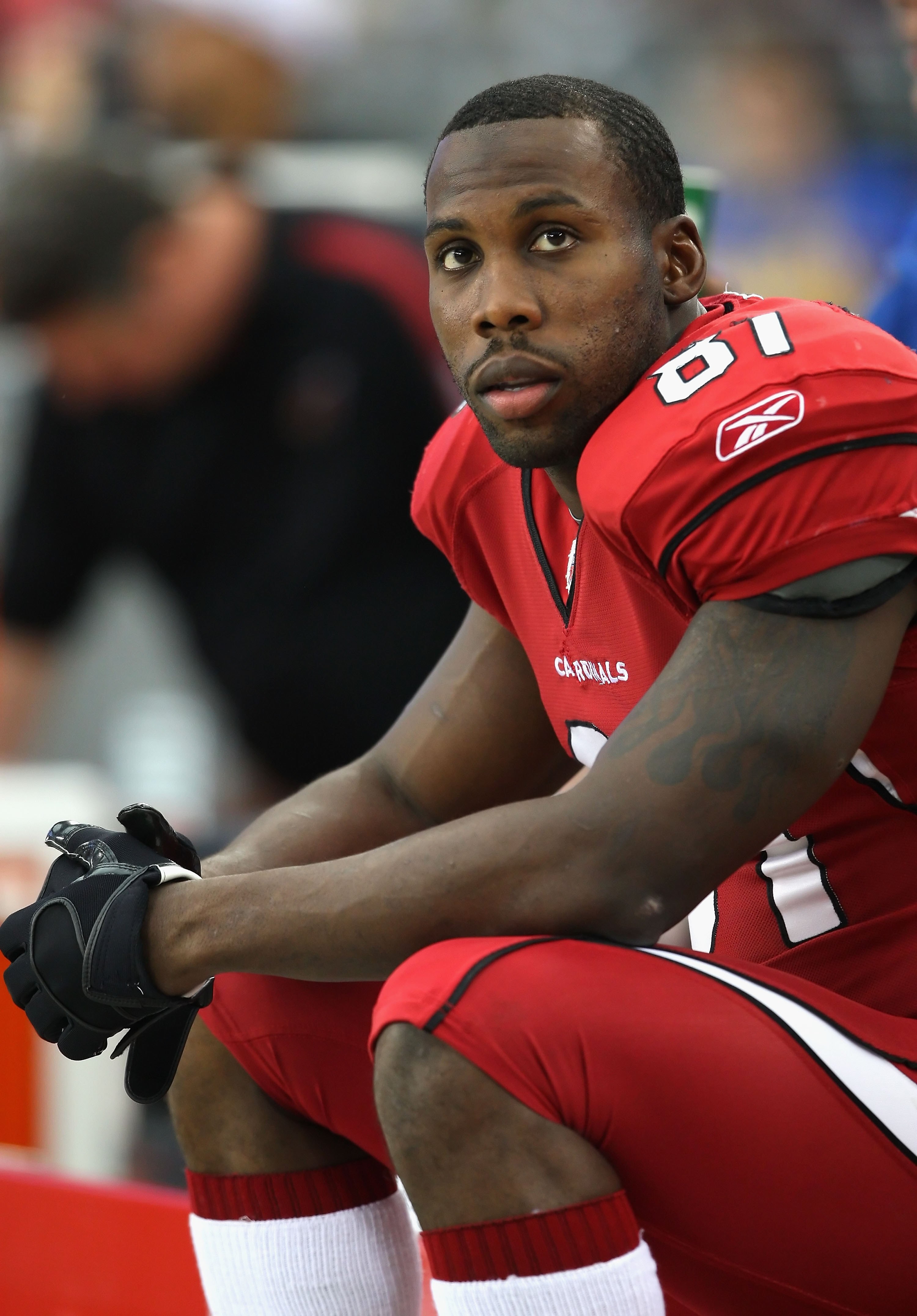 GLENDALE, AZ - JANUARY 03:  Wide receiver Anquan Boldin #81 of the Arizona Cardinals sits on the bench during the NFL game against the Green Bay Packers at the Universtity of Phoenix Stadium on January 3, 2010 in Glendale, Arizona. The Packers defeated th