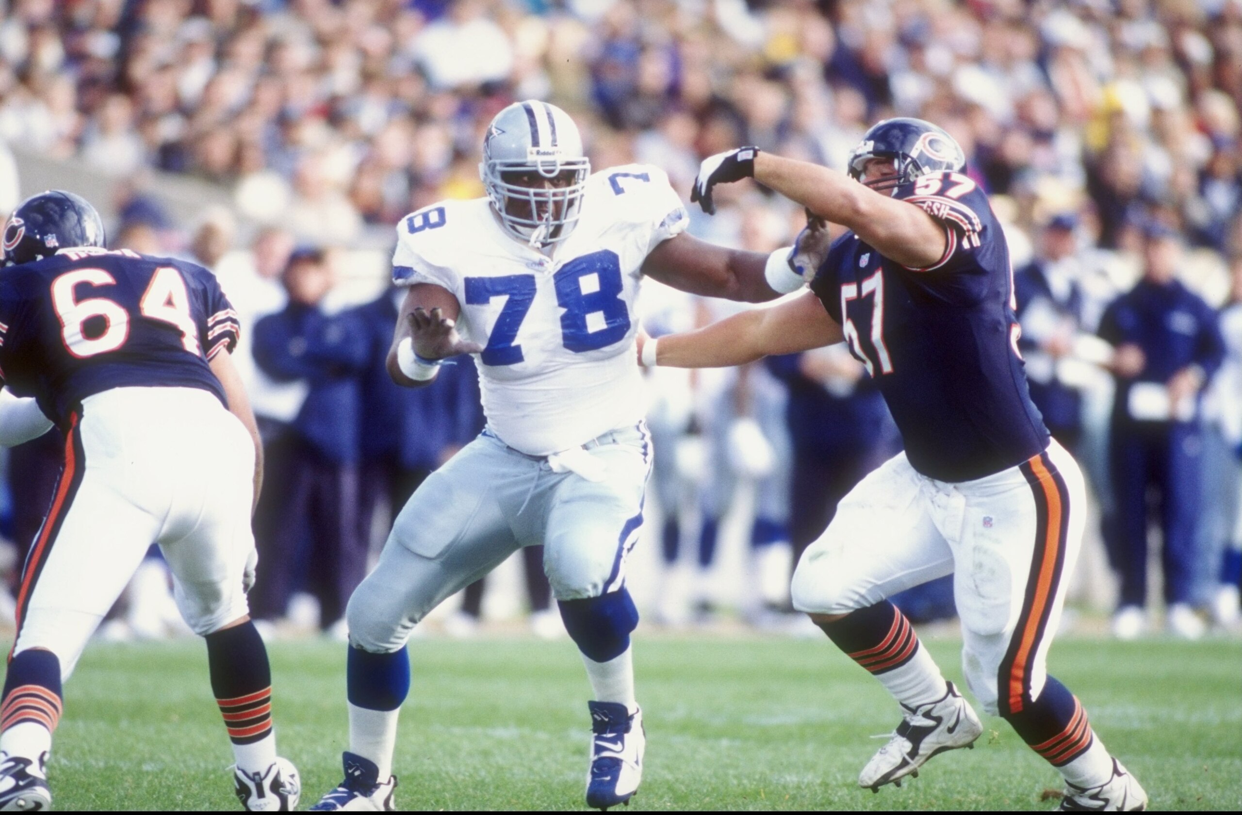18 Oct 1998:  Defensive tackle Leon Lett #78 of the Dallas Cowboys in action against center Olin Kreutz #57 of the Chicago Bears during the game at Soldier Field in Chicago, Illinois. The Bears defeated the Cowboys 13-12. Mandatory Credit: Jonathan Daniel