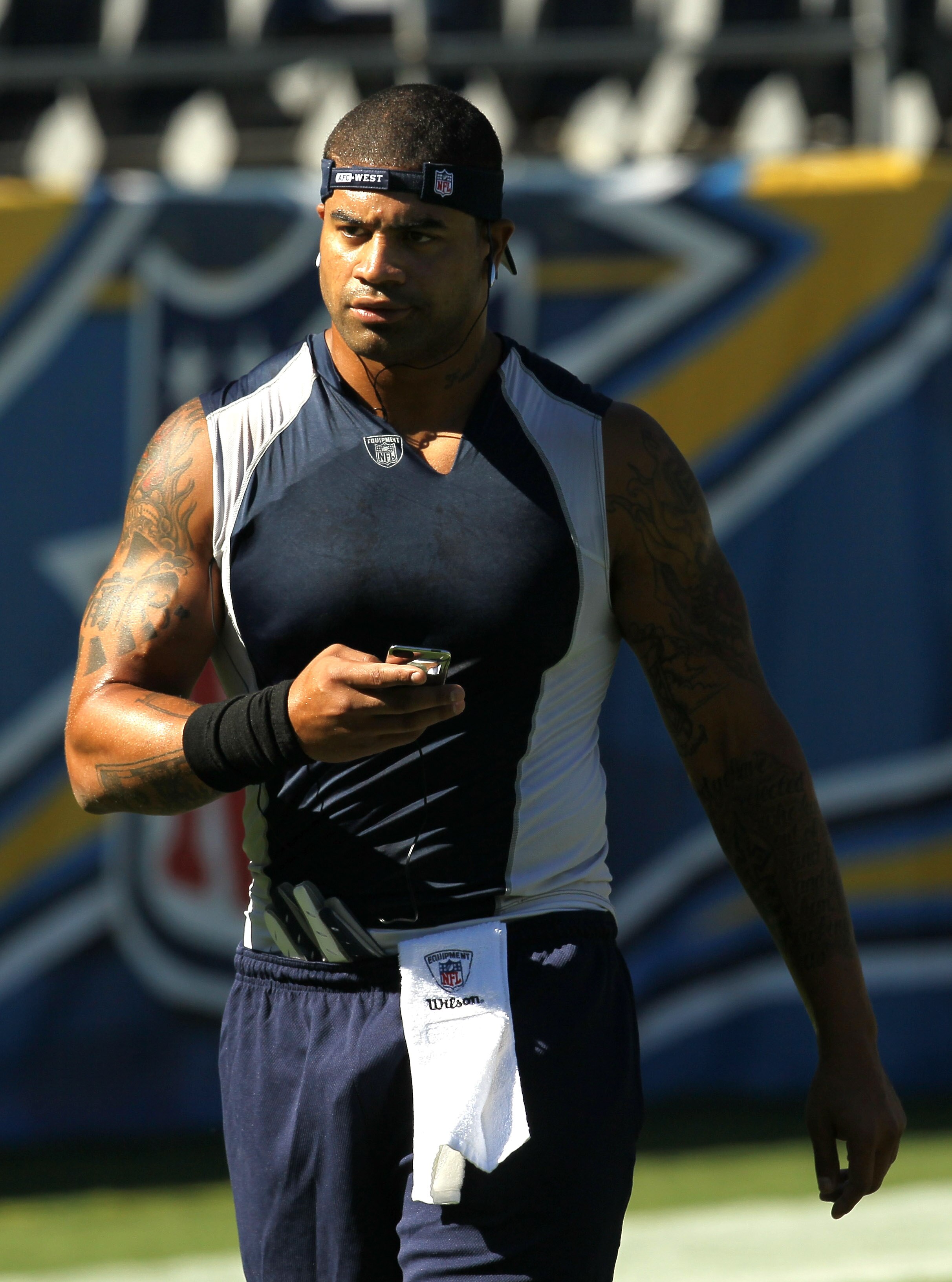 SAN DIEGO - AUGUST 14:  Linebacker Shawne Merriman #56 of the San Diego Chargers works out before the game with the Chicago Bears on August 14, 2010 at Qualcomm Stadium in San Diego, California.   Merriman signed his one year tender contract on Friday and