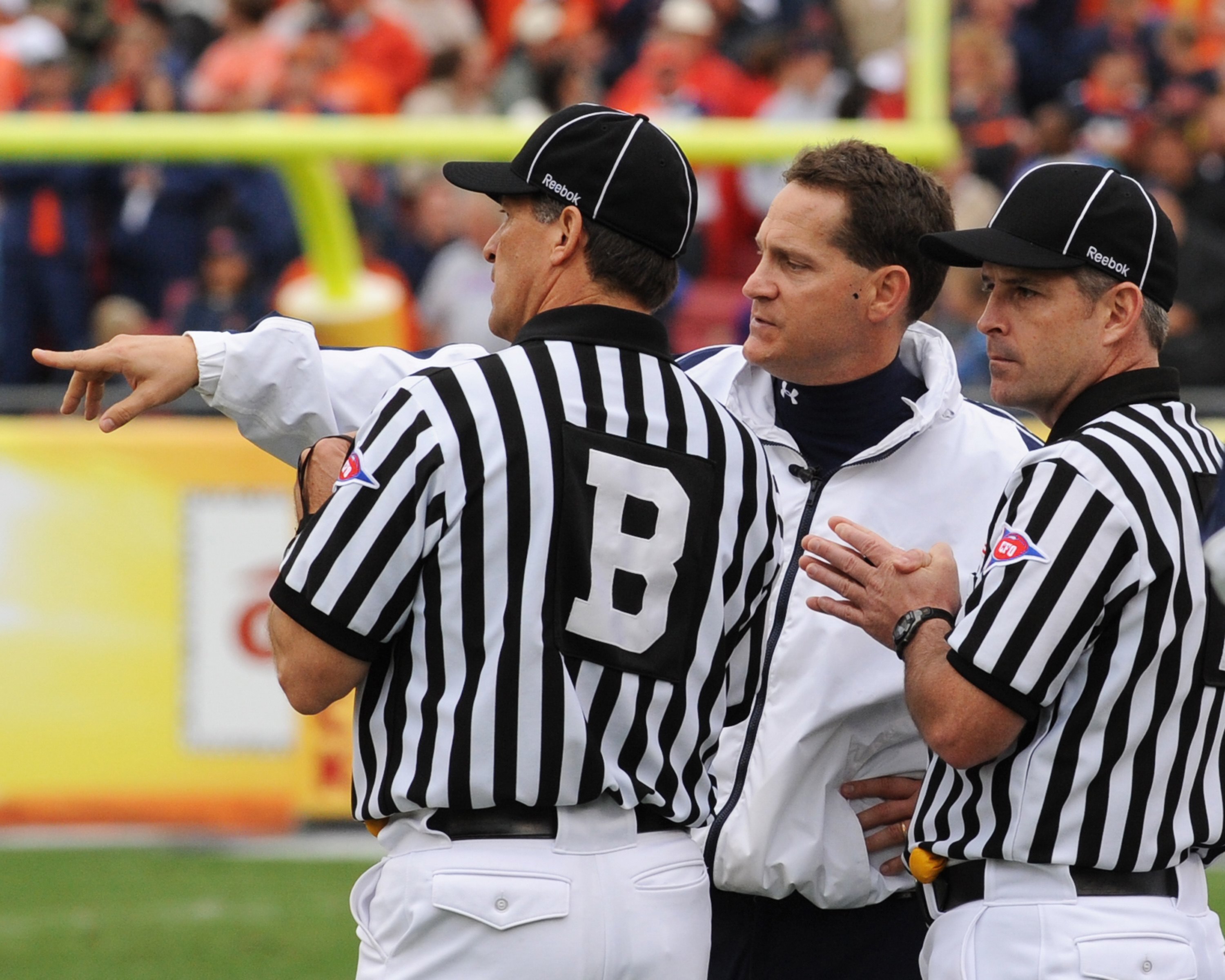 TAMPA, FL - JANUARY 1: Coach Gene Chizik of the Auburn Tigers questions a call during play against the Northwestern Wildcats in the Outback Bowl January 1, 2010 at Raymond James Stadium in Tampa, Florida.  (Photo by Al Messerschmidt/Getty Images)