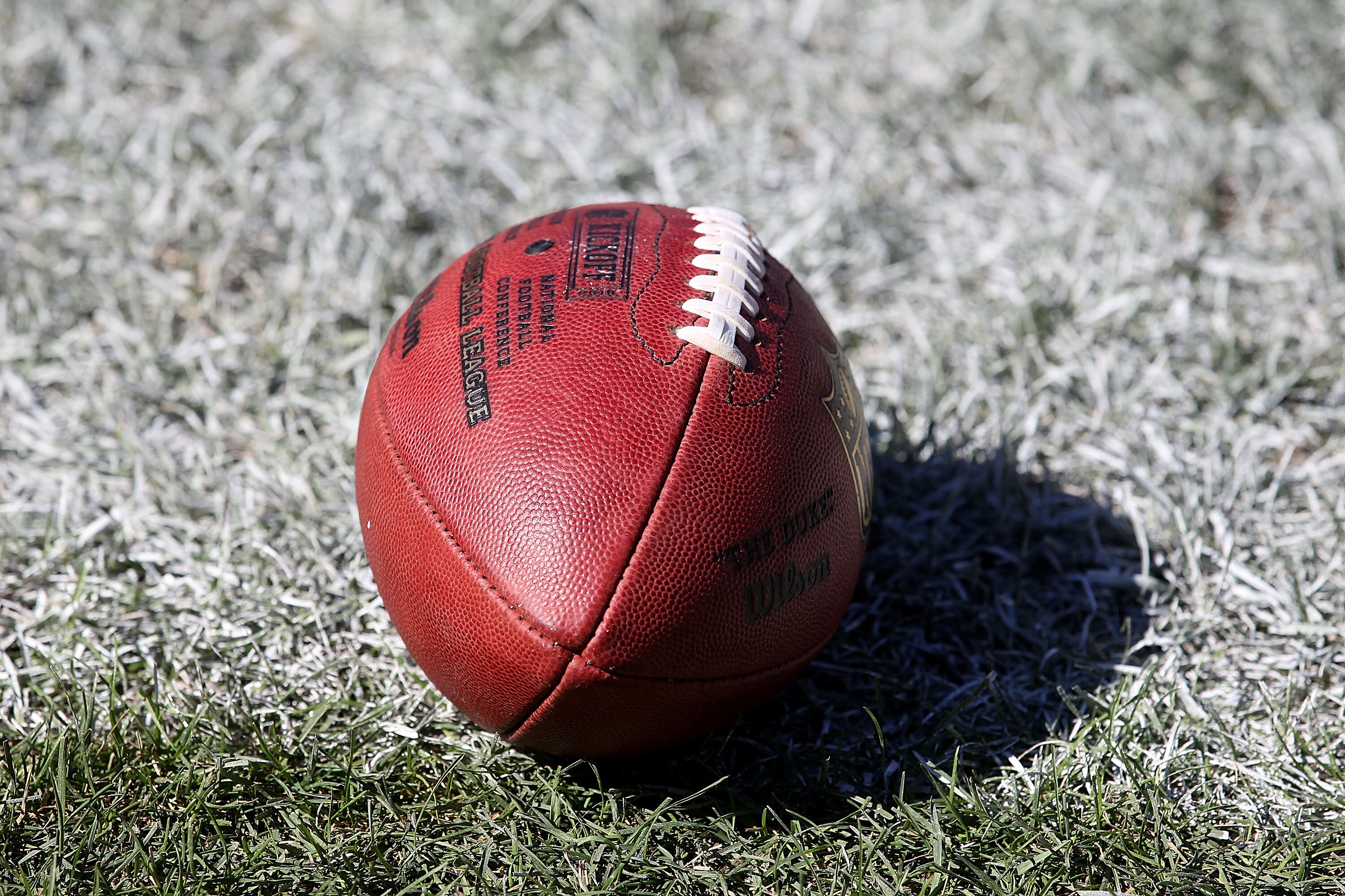 CHICAGO - SEPTEMBER 12: A football rests on the ground during the NFL season opening game between the Chicago Bears and the Detroit Lions at Soldier Field on September 12, 2010 in Chicago, Illinois. The Bears defeated the Lions 19-14. (Photo by Jonathan D
