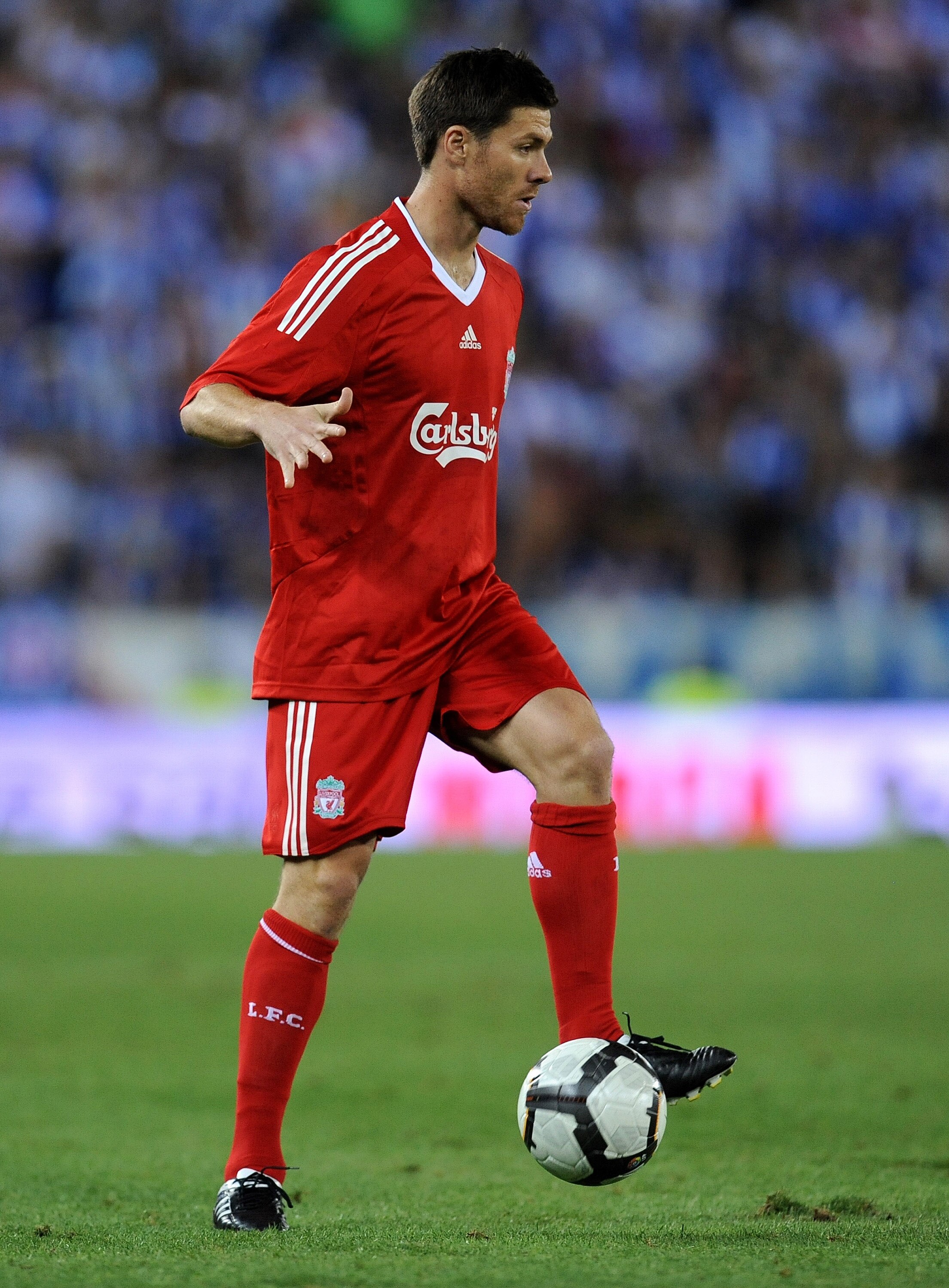 BARCELONA, SPAIN - AUGUST 02:  Xabi Alonso of Liverpool controls the ball during the pre-season friendly match between Espanyol and Liverpool at the Nuevo Estadio de Cornella-El Prat on August 2, 2009 in Barcelona, Spain. Espanyol won the match 3-0.  (Pho