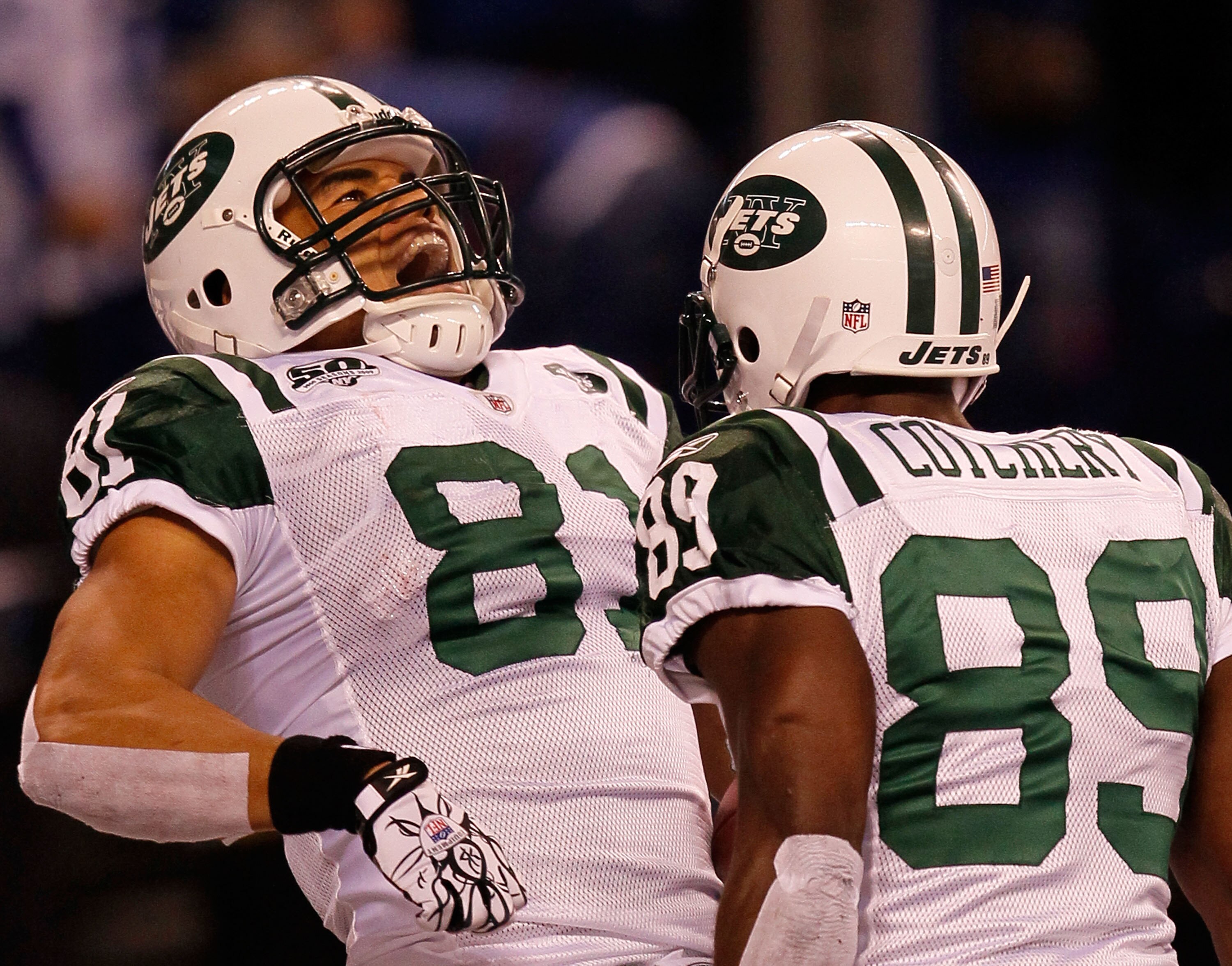 INDIANAPOLIS - JANUARY 24:  Dustin Keller #81 of the New York Jets celebrates his touchdown in the second quarter with teammate Jerricho Cotchery #89 while playing against the Indianapolis Colts during the AFC Championship Game at Lucas Oil Stadium on Jan