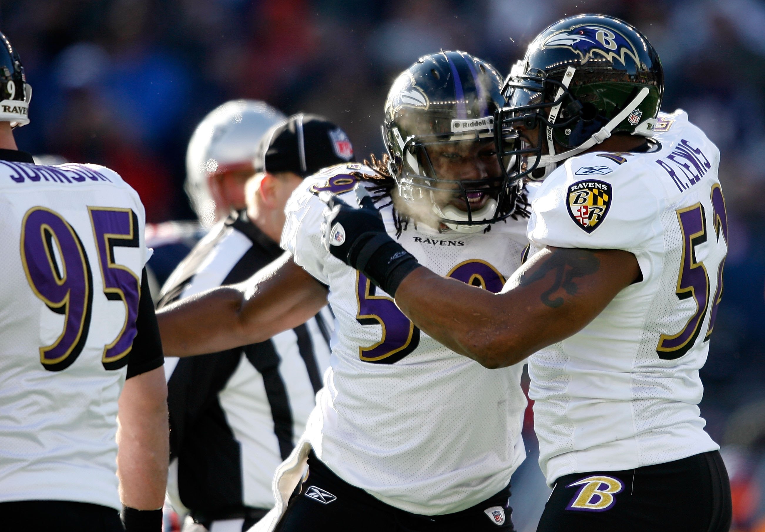 FOXBORO, MA - JANUARY 10: Dannell Ellerbe #59 and Ray Lewis #52 of the Baltimore Ravens celebrate a defensive play against the New England Patriots during the 2010 AFC wild-card playoff game at Gillette Stadium on January 10, 2010 in Foxboro, Massachuset FOXBORO, MA - JANUARY 10: Dannell Ellerbe #59 and Ray Lewis #52 of the Baltimore Ravens celebrate a defensive play against the New England Patriots during the 2010 AFC wild-card playoff game at Gillette Stadium on January 10, 2010 in Foxboro, Massachuset