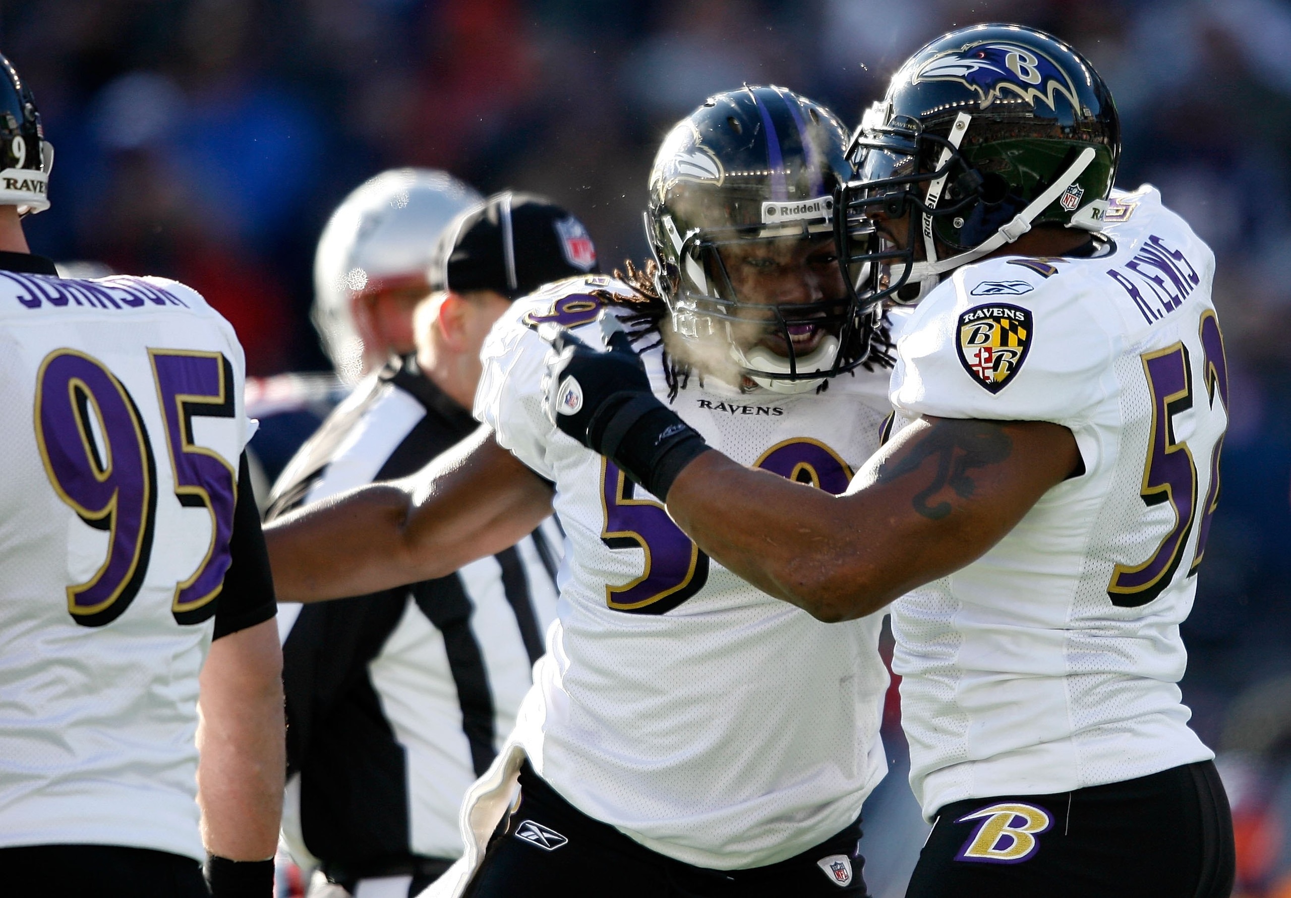 FOXBORO, MA - JANUARY 10:  Dannell Ellerbe #59 and Ray Lewis #52 of the Baltimore Ravens celebrate a defensive play against the New England Patriots during the 2010 AFC wild-card playoff game at Gillette Stadium on January 10, 2010 in Foxboro, Massachuset