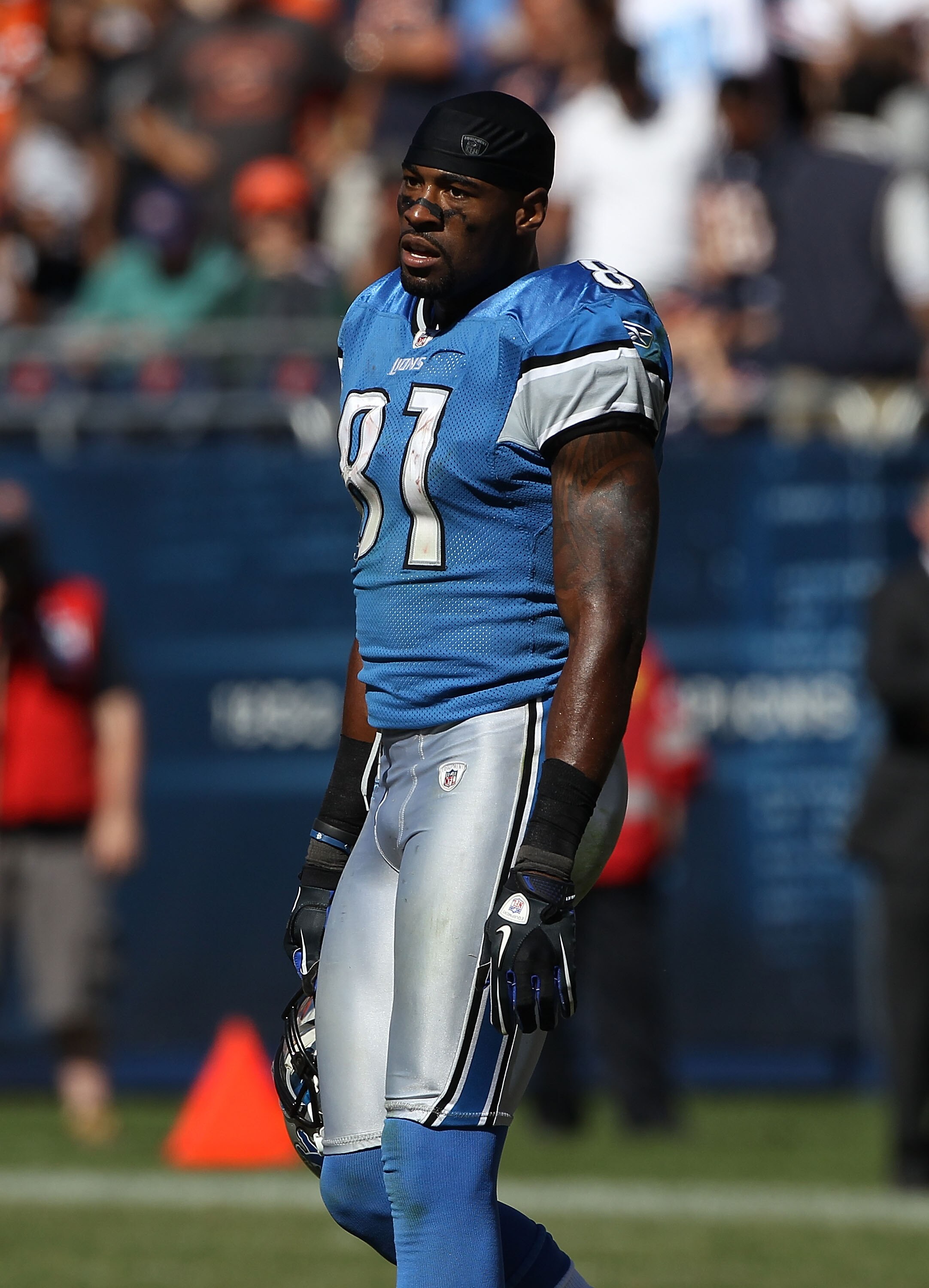 CHICAGO - SEPTEMBER 12: Calvin Johnson #81 of the Detroit Lions waits for a instant replay ruling on an apparent touchdown catch in the final minute against the Chicago Bears during the NFL season opening game at Soldier Field on September 12, 2010 in Chi