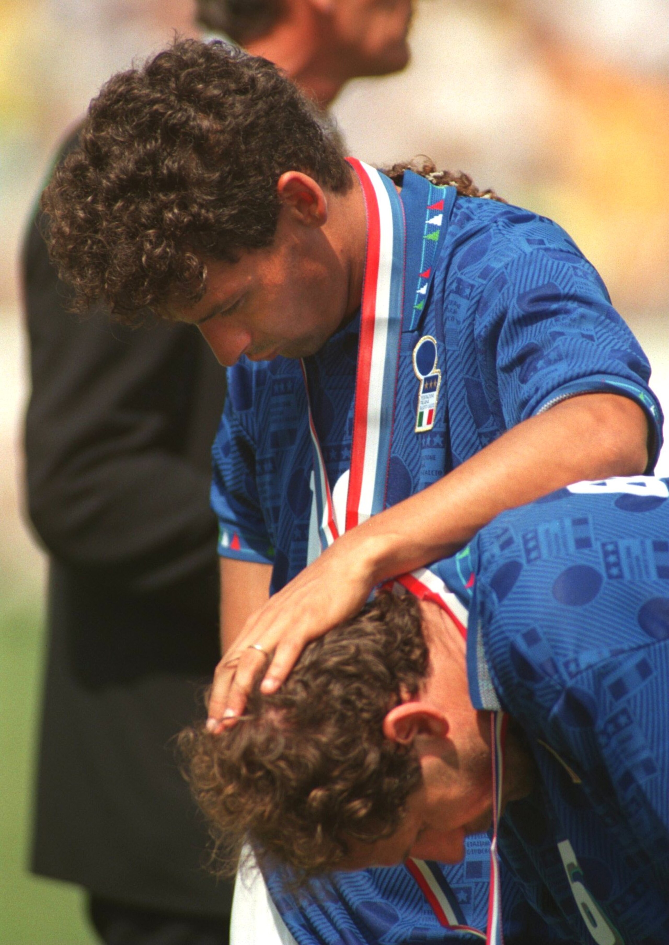 17 Jul 1994: ROBERTO BAGGIO CONSOLES THE ITALIAN CAPTAIN FRANCO BARESI AFTER THE 1994 WORLD CUP FINAL AT THE ROSE BOWL STADIUM IN PASADENA CALIFORNIA. BRAZIL WON THE WORLD CUP ON PENALTIES.