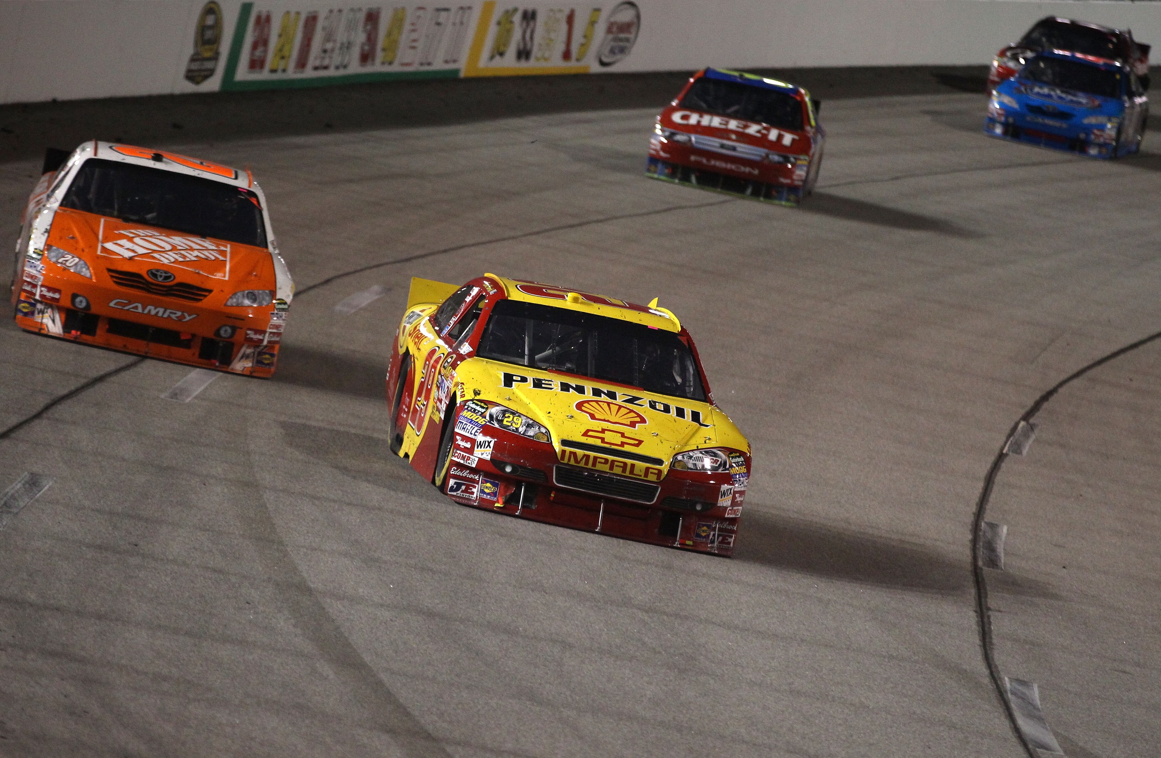 RICHMOND, VA - SEPTEMBER 11:  Kevin Harvick, driver of the #29 Shell/Pennzoil Chevrolet,  leads a group of cars during the NASCAR Sprint Cup Series Air Guard 400 at Richmond International Raceway on September 11, 2010 in Richmond, Virginia.  (Photo by Str