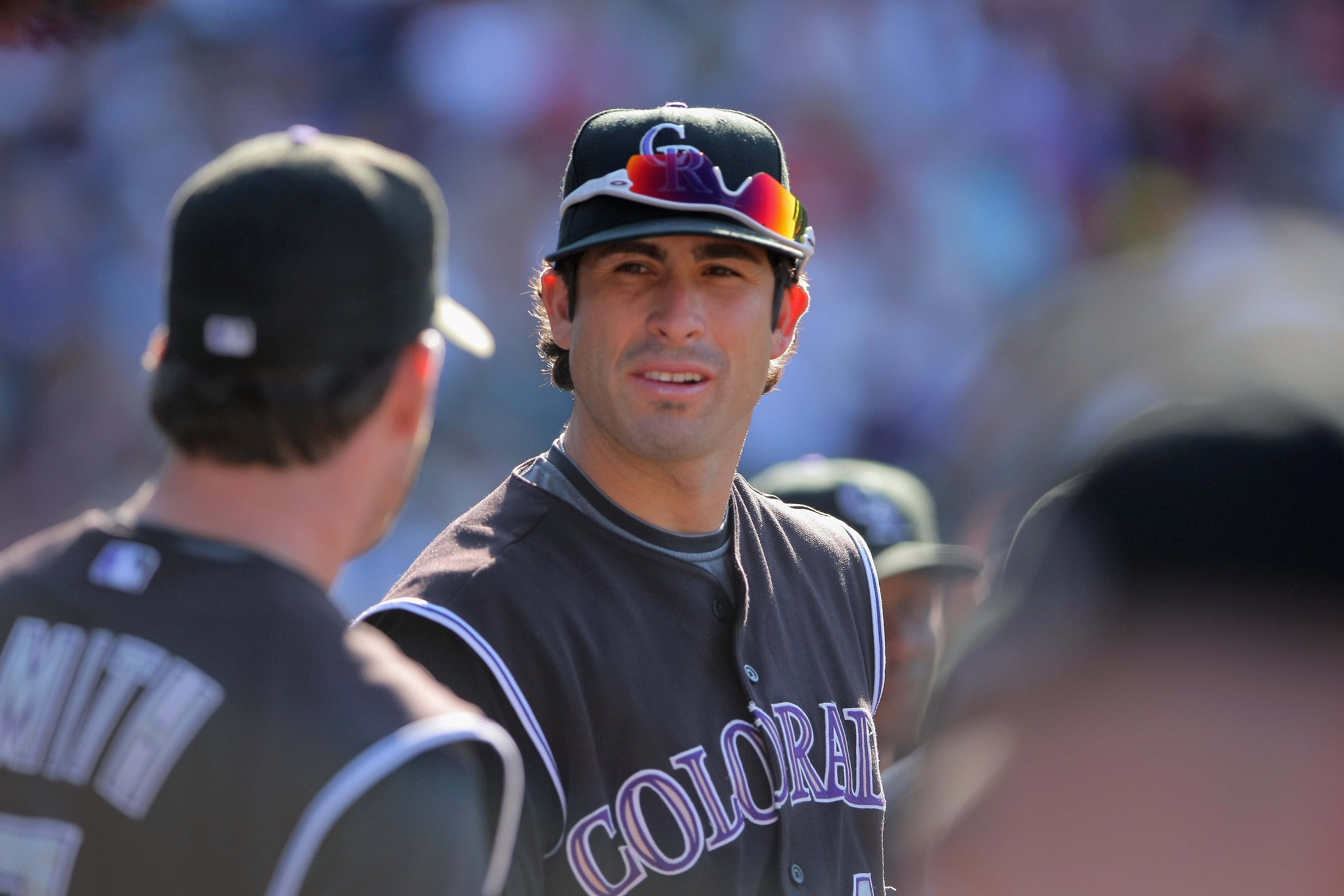 DENVER - SEPTEMBER 27:  Ryan Spilborghs #19 of the Colorado Rockies looks on from the dugout against the St. Louis Cardinals at Coors Field on September 27, 2009 in Denver, Colorado. The Rockies defeated the Cardinals 4-3.  (Photo by Doug Pensinger/Getty