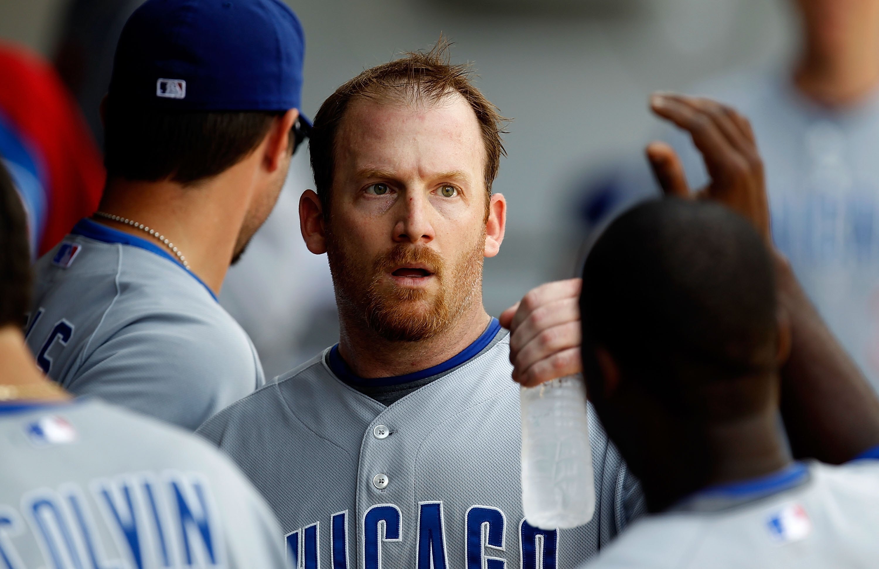 CHICAGO - JUNE 27: Starting pitcher Ryan Dempster #46 of the Chicago Cubs is congratulated by teammates in the dugout after the 7th inning of a game against the Chicago White Sox at U.S. Cellular Field on June 27, 2010 in Chicago, Illinois. The Cubs defea