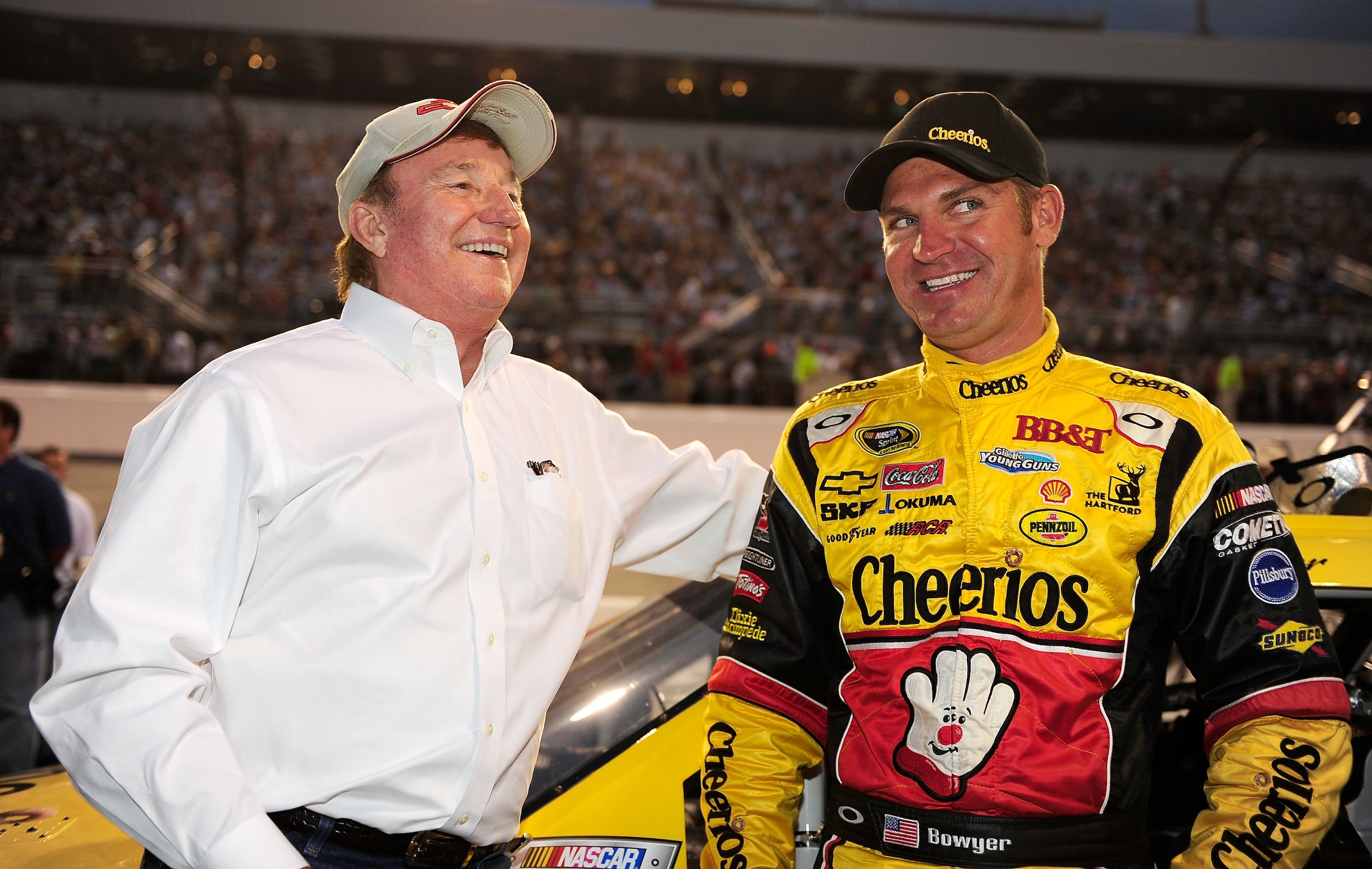 RICHMOND, VA - SEPTEMBER 11: Team owner Richard Childress (L) speaks with Clint Bowyer, driver of the #33 Cheerio's Chevrolet, prior to the start of the NASCAR Sprint Cup Series Air Guard 400 at Richmond International Raceway on September 11, 2010 in Rich