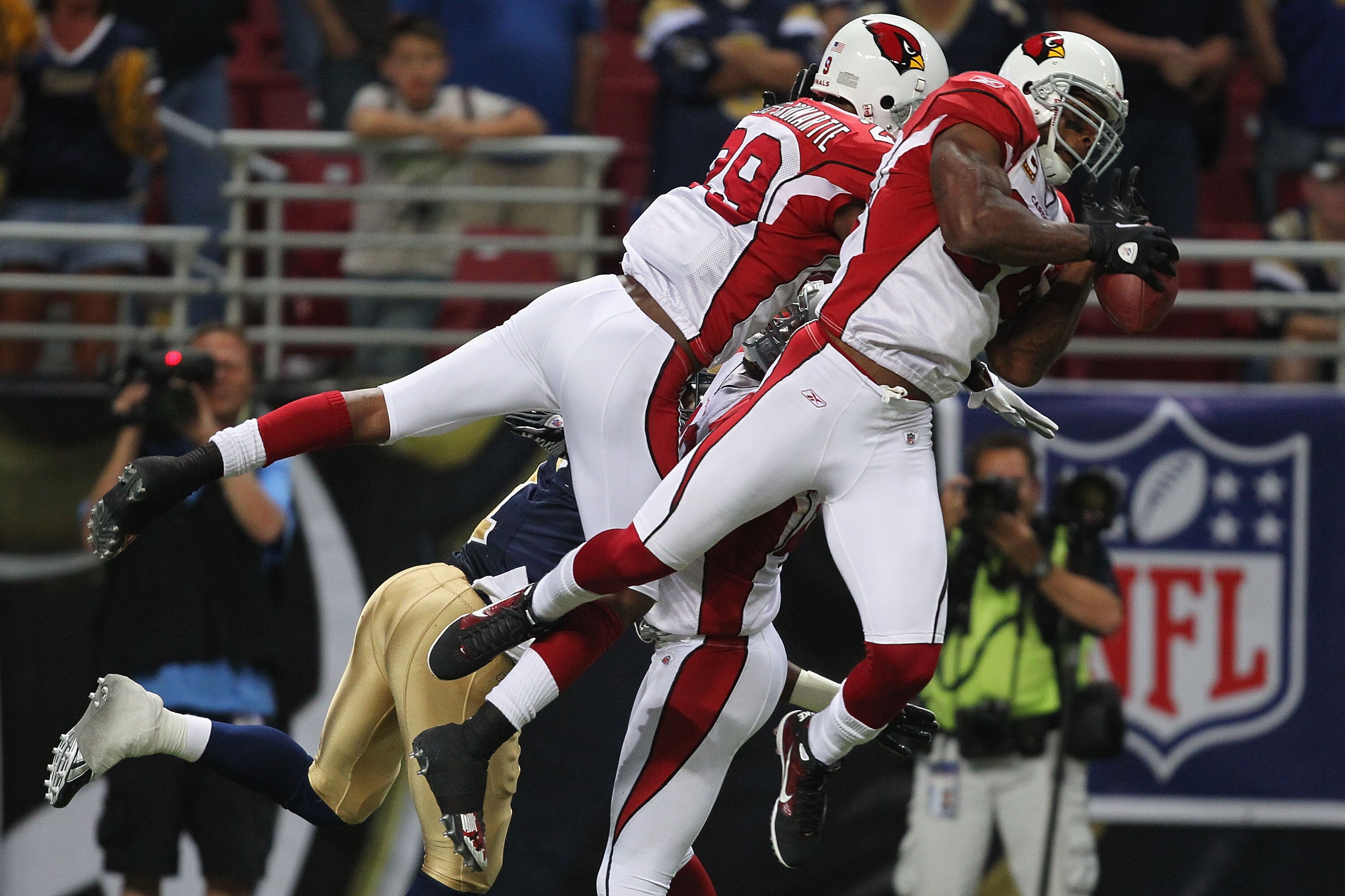 ST. LOUIS - SEPTEMBER 12: Adrian Wilson #24 of the Arizona Cardinals knocks down the final pass of the game against the St. Louis Rams during the NFL season opener at the Edward Jones Dome on September 12, 2010 in St. Louis, Missouri.  The Cardinals beat 
