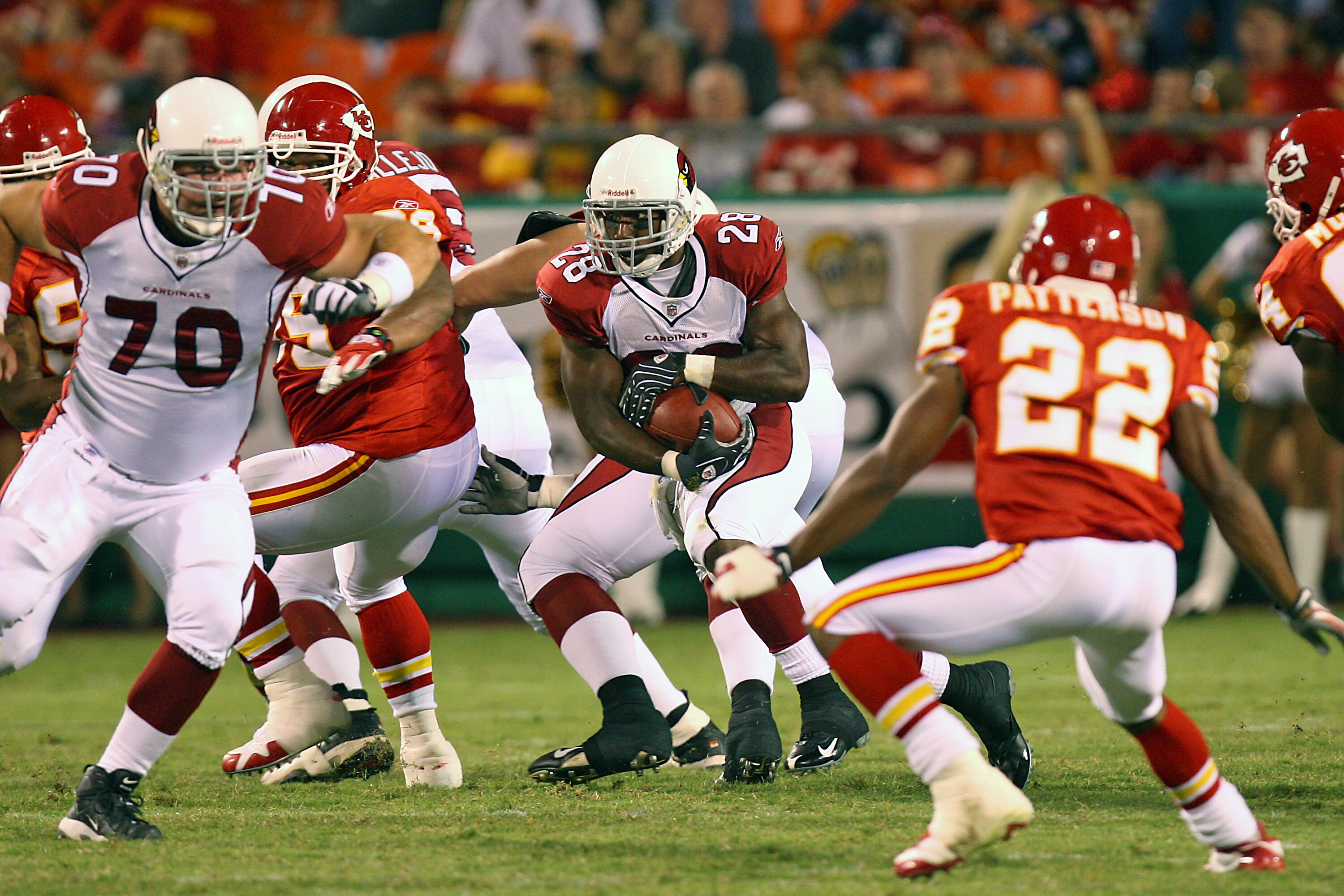 KANSAS CITY, MO - AUGUST 16:  J.J. Arrington #28 of the Arizona Cardinals looks for running room during a preseason game against the Kansas City Chiefs on August 16, 2008 at Arrowhead Stadium in Kansas City, Mo.  (Photo by G. Newman Lowrance/Getty Images)