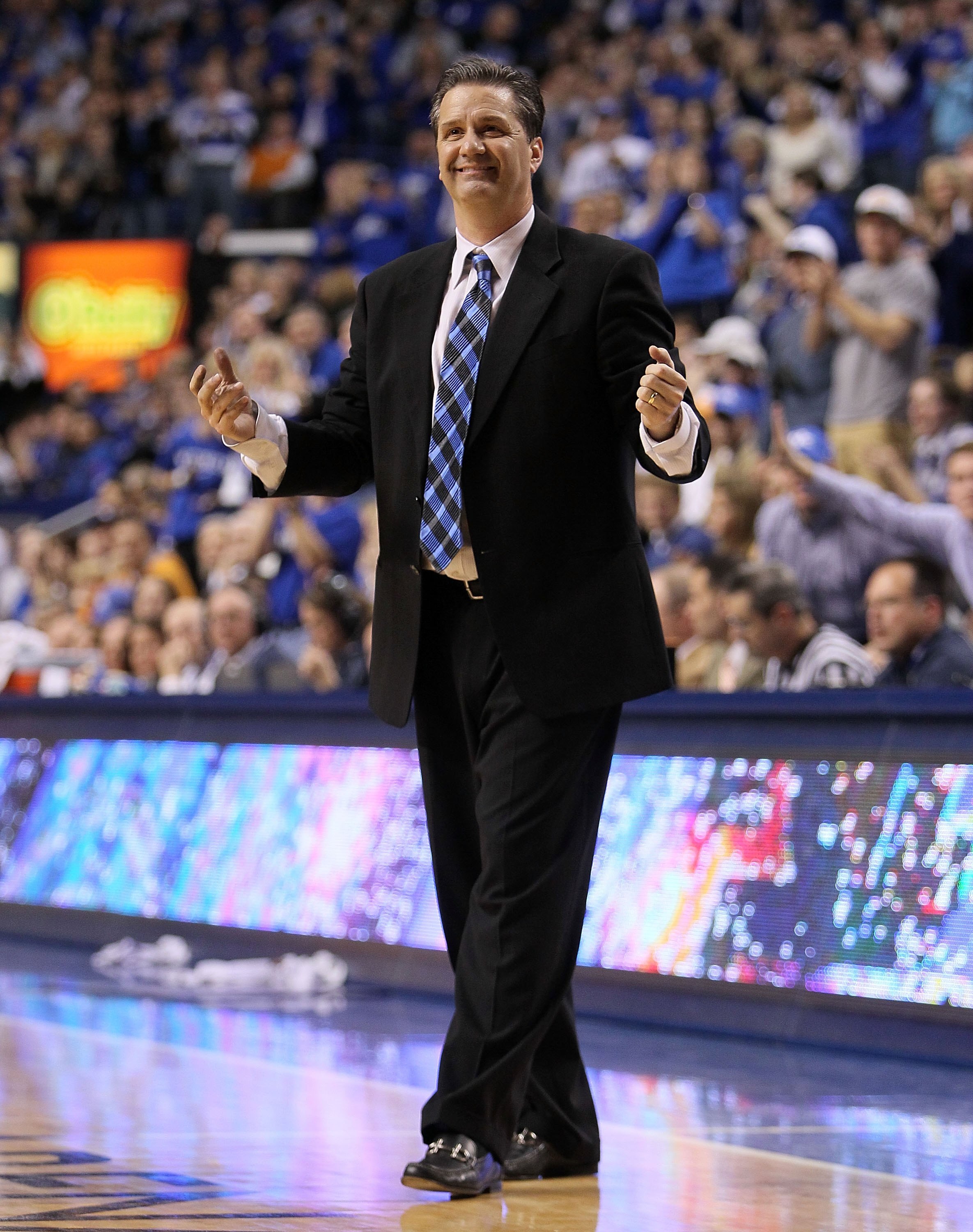 LEXINGTON, KY - FEBRUARY 13:  John Calipari the Head Coach of the Kentucky Wilcats gives instructions to his team during the SEC game against the Tennessee Volunteers on February 13, 2010 at Rupp Arena in Lexington, Kentucky.  (Photo by Andy Lyons/Getty I
