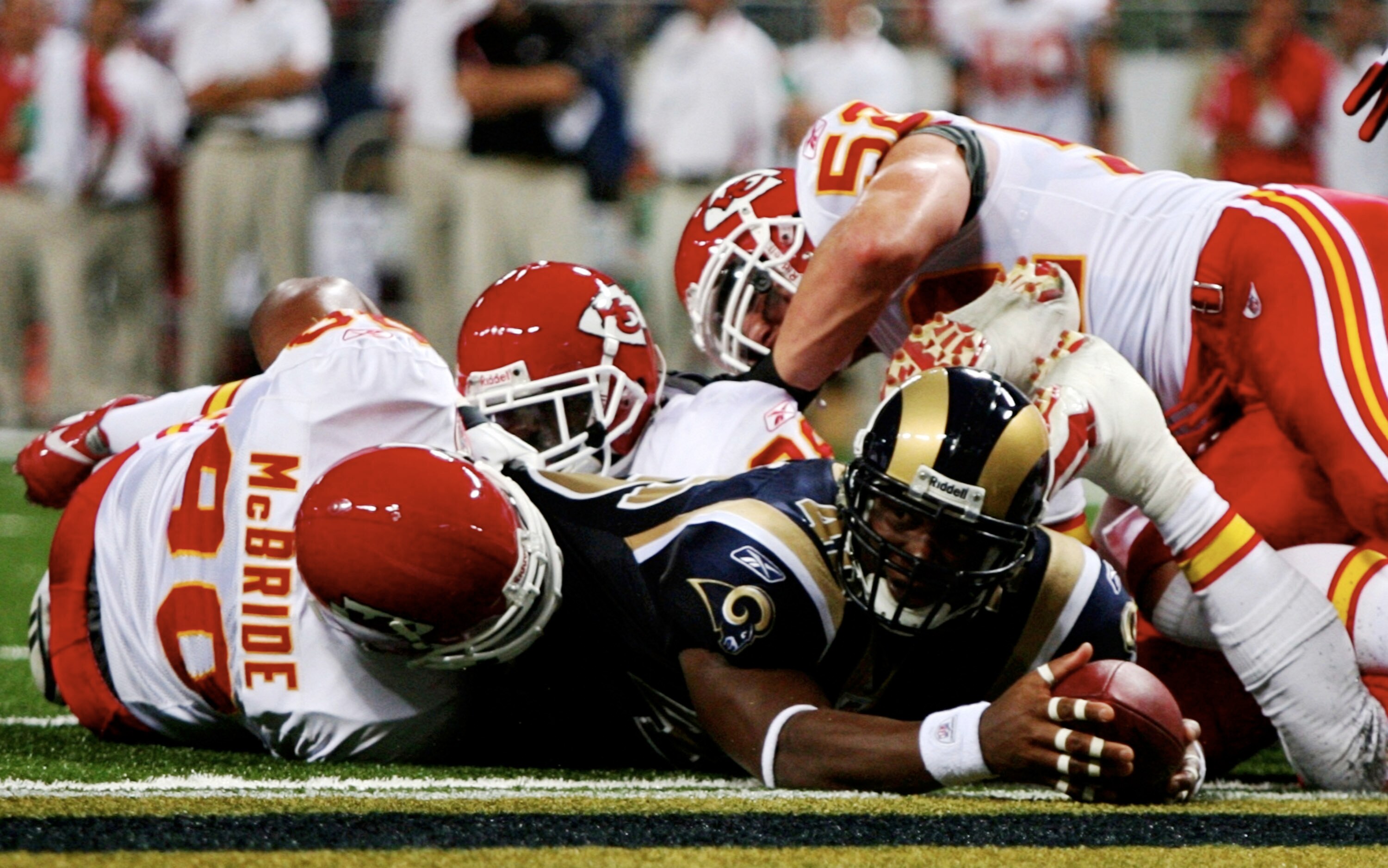 ST. LOUIS, MO - SEPTEMBER 03: Tight end Daniel Fells #46 of the St. Louis Rams dives into the end zone to score a touchdown in the second quarter against the Kansas City Chiefs during the preseason game at the Edward Jones Dome on September 3, 2009 in St.