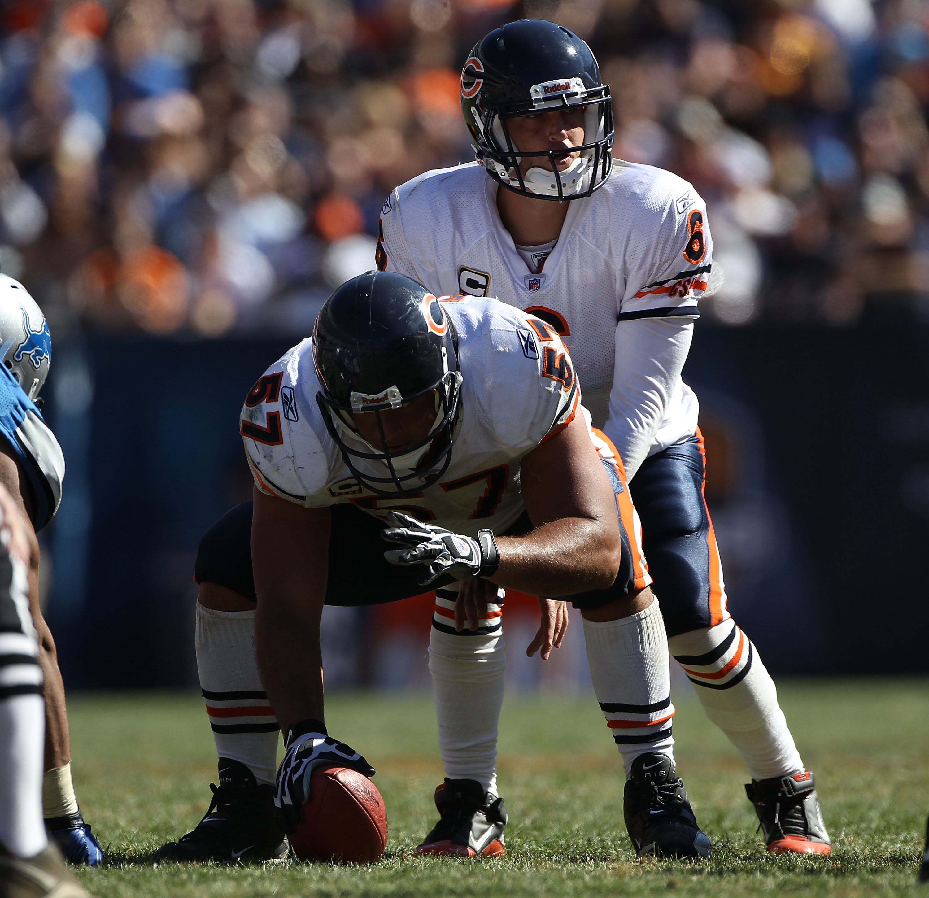 CHICAGO - SEPTEMBER 12: Jay Cutler #6 of the Chicago Bears calls play signals as teammate Olin Kreutz #57 prepares to snap the ball against the Detroit Lions during the NFL season opening game at Soldier Field on September 12, 2010 in Chicago, Illinois. T