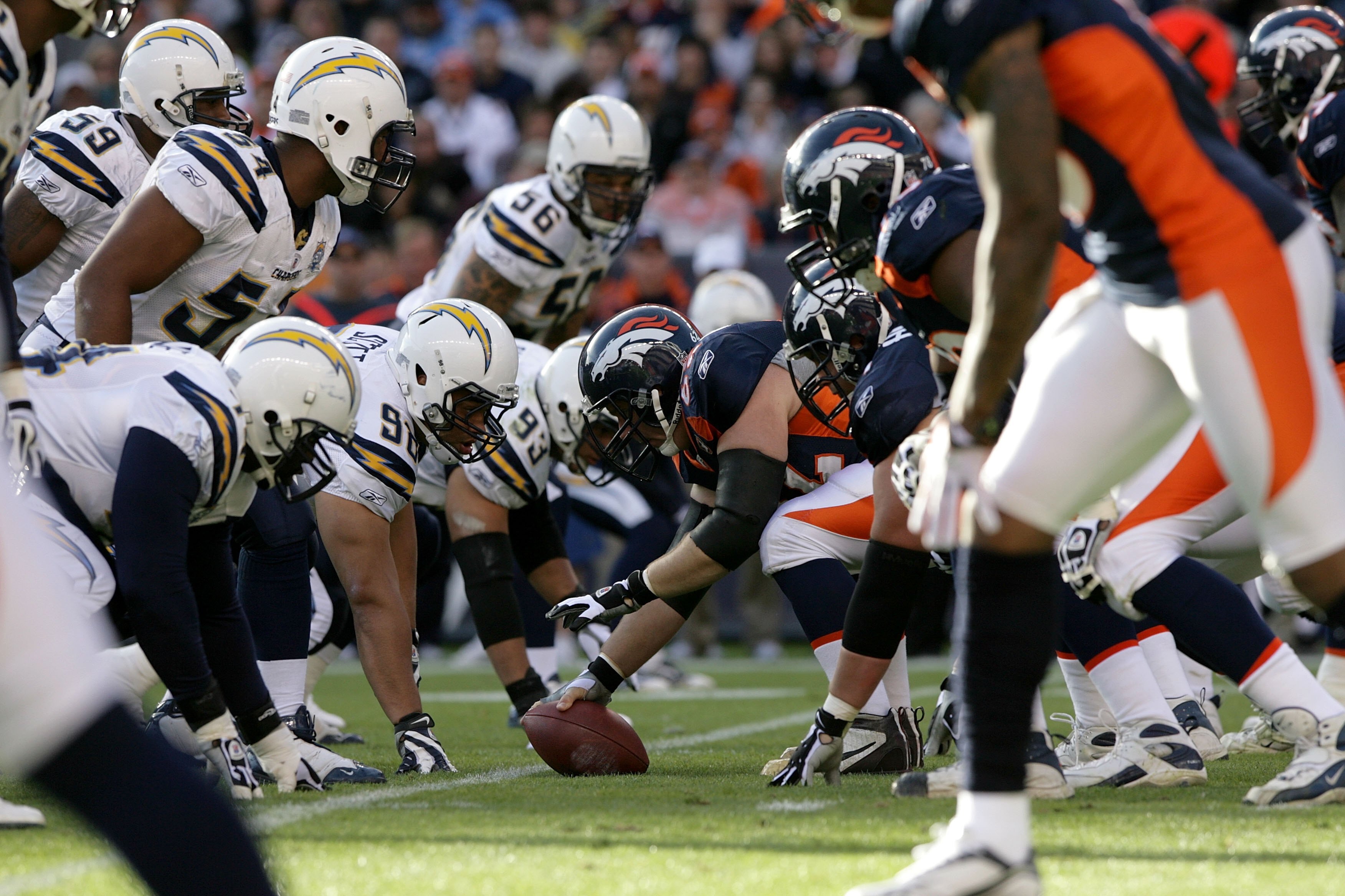 DENVER - NOVEMBER 22:  The Denver Broncos offense faces off against the San Diego Chargers defense on the line of scrimmage during NFL action at Invesco Field at Mile High on November 22, 2009 in Denver, Colorado. The Chargers defeated the Broncos 32-3.  