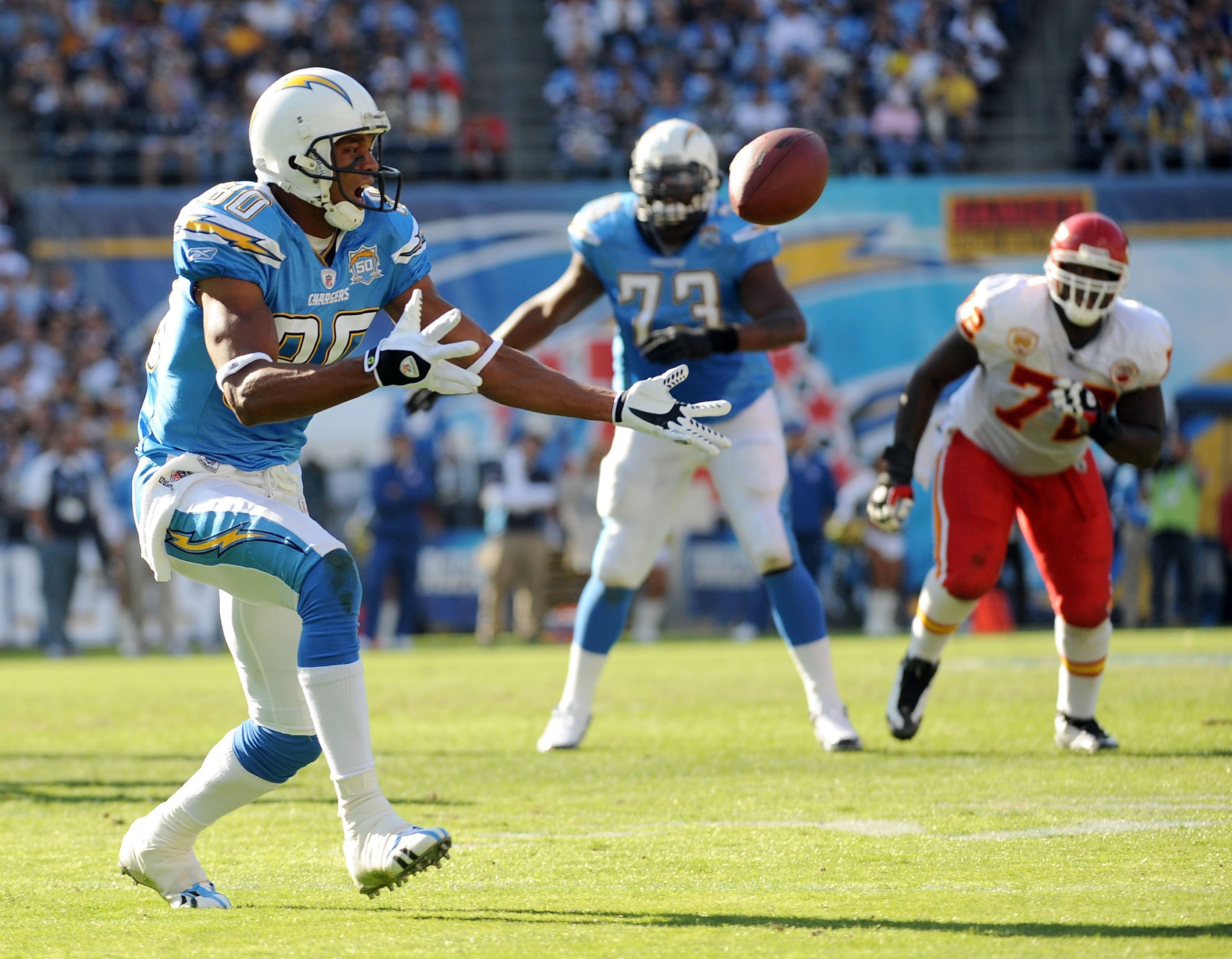 SAN DIEGO - NOVEMBER 29:  Malcom Floyd #80 of the San Diego Chargers juggles a pass against the Kansas City Chiefs at Qualcomm Stadium on November 29, 2009 in San Diego, California.  (Photo by Harry How/Getty Images)