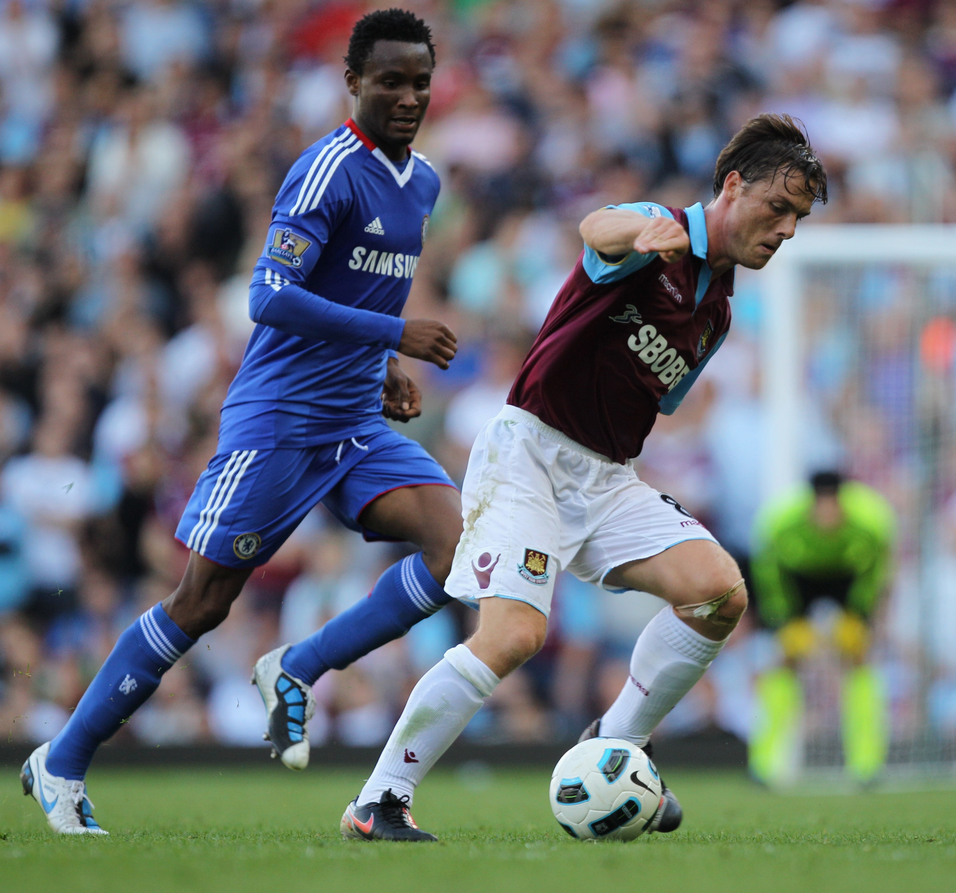 LONDON, ENGLAND - SEPTEMBER 11: Scott Parker of West Ham United is watched by John Obi Mikel of Chelsea during the Barclays Premier League match between West Ham United and Chelsea at the Boleyn Ground on September 11, 2010 in London, England. (Photo by LONDON, ENGLAND - SEPTEMBER 11: Scott Parker of West Ham United is watched by John Obi Mikel of Chelsea during the Barclays Premier League match between West Ham United and Chelsea at the Boleyn Ground on September 11, 2010 in London, England. (Photo by