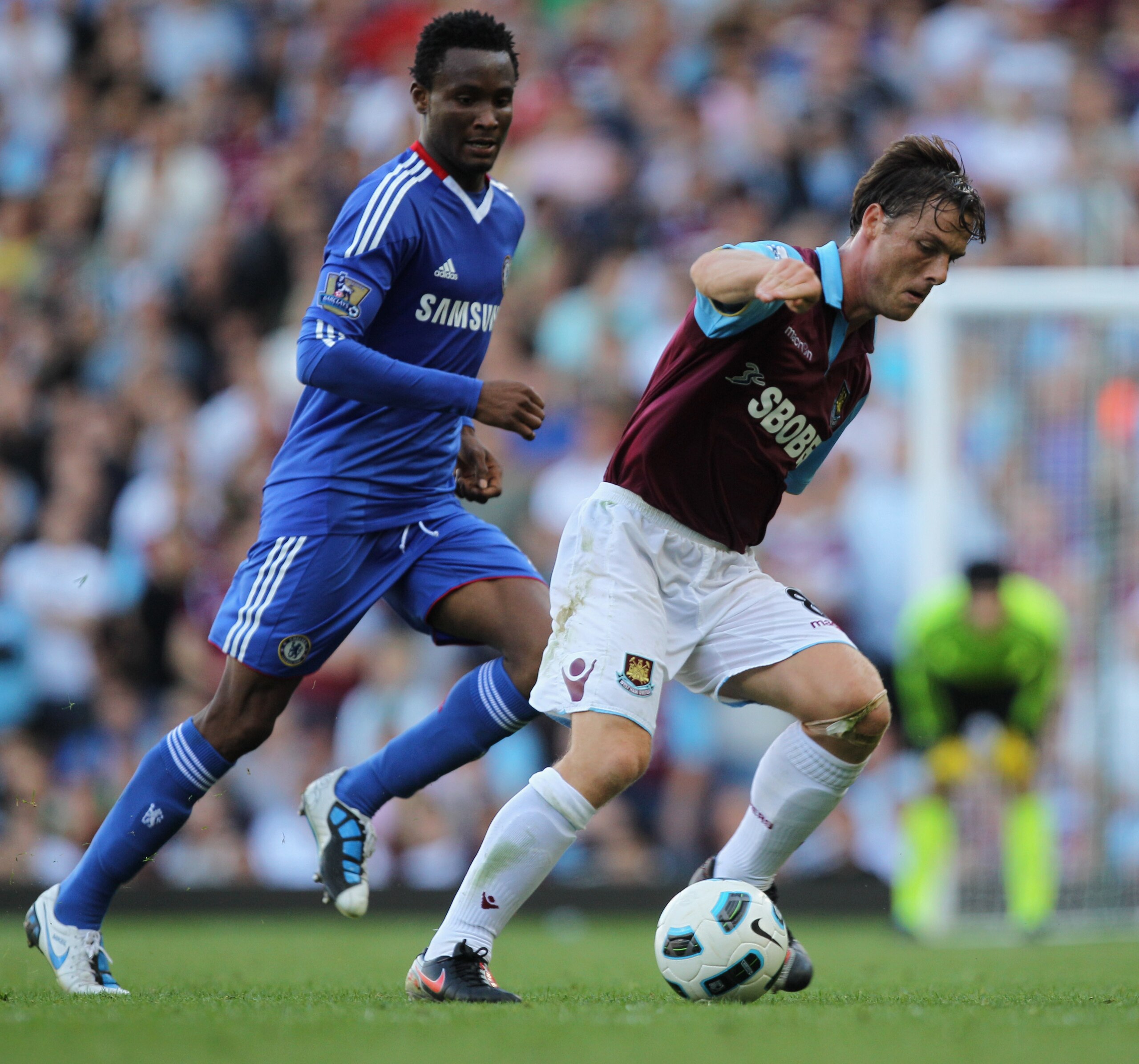 LONDON, ENGLAND - SEPTEMBER 11: Scott Parker of West Ham United is watched by John Obi Mikel of Chelsea during the Barclays Premier League match between West Ham United and Chelsea at the Boleyn Ground on September 11, 2010 in London, England. (Photo by LONDON, ENGLAND - SEPTEMBER 11: Scott Parker of West Ham United is watched by John Obi Mikel of Chelsea during the Barclays Premier League match between West Ham United and Chelsea at the Boleyn Ground on September 11, 2010 in London, England. (Photo by