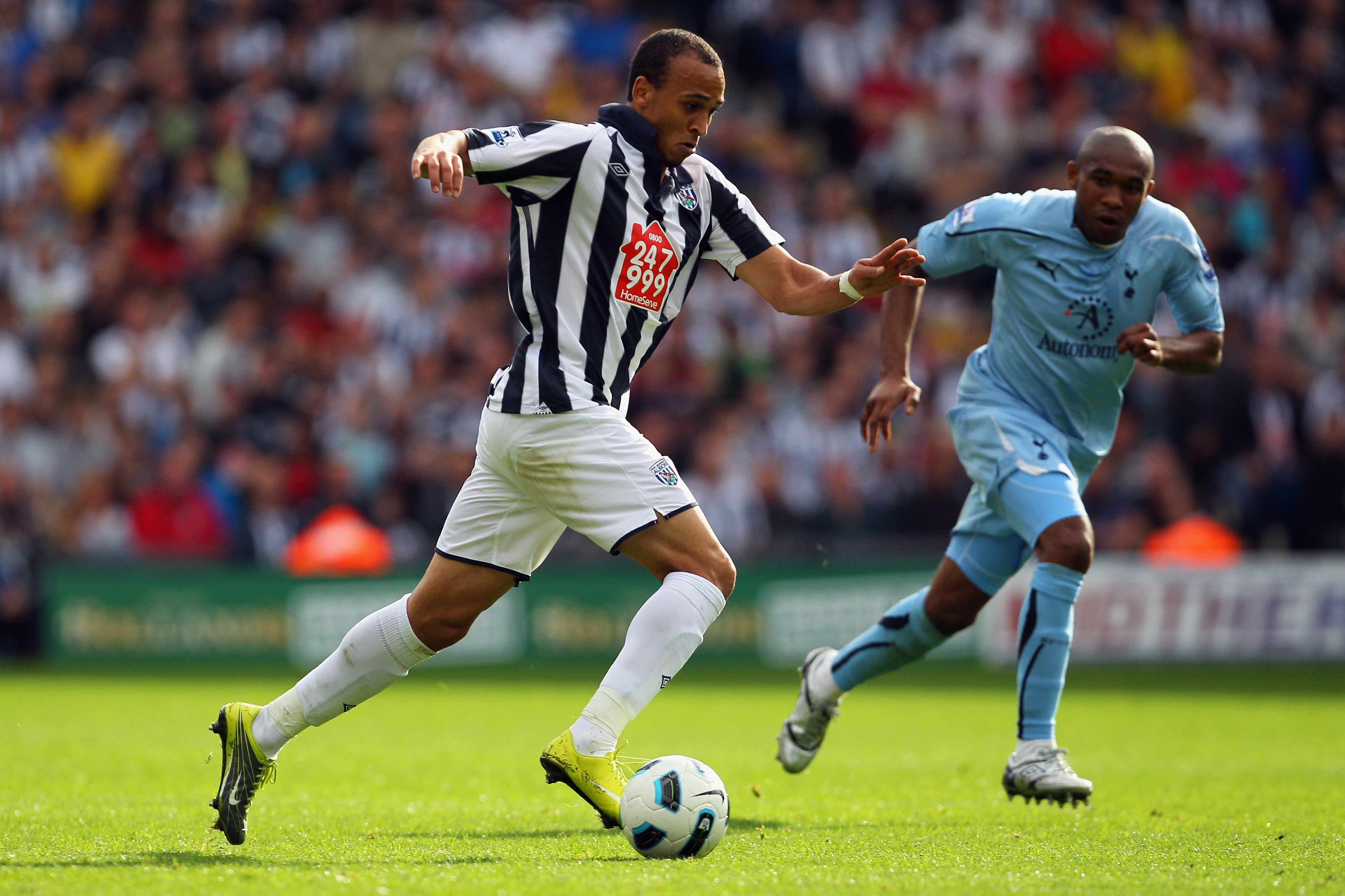 WEST BROMWICH, ENGLAND - SEPTEMBER 11: Gianni Zuiverloon of West Bromwich Albion in action during the Barclays Premier League match between West Bromwich Albion and Tottenham Hotspur at The Hawthorns on September 11, 2010 in West Bromwich, England. (Phot WEST BROMWICH, ENGLAND - SEPTEMBER 11: Gianni Zuiverloon of West Bromwich Albion in action during the Barclays Premier League match between West Bromwich Albion and Tottenham Hotspur at The Hawthorns on September 11, 2010 in West Bromwich, England. (Phot