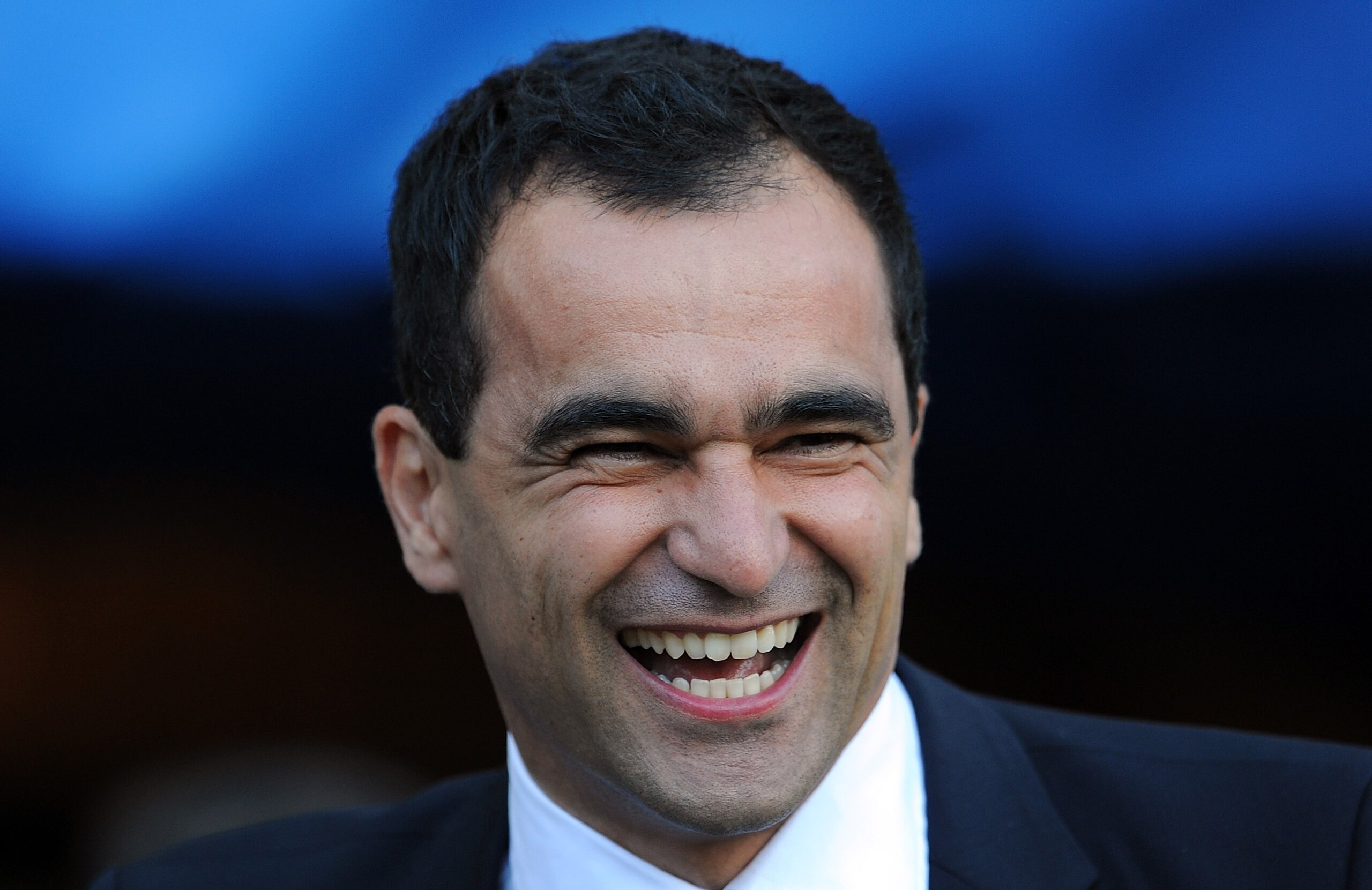 WIGAN, ENGLAND - SEPTEMBER 11: Wigan Athletic manager Roberto Martinez laughs during the Barclays Premier League match between Wigan Athletic and Sunderland at DW Stadium on September 11, 2010 in Wigan, England. (Photo by Chris Brunskill/Getty Images) WIGAN, ENGLAND - SEPTEMBER 11: Wigan Athletic manager Roberto Martinez laughs during the Barclays Premier League match between Wigan Athletic and Sunderland at DW Stadium on September 11, 2010 in Wigan, England. (Photo by Chris Brunskill/Getty Images)