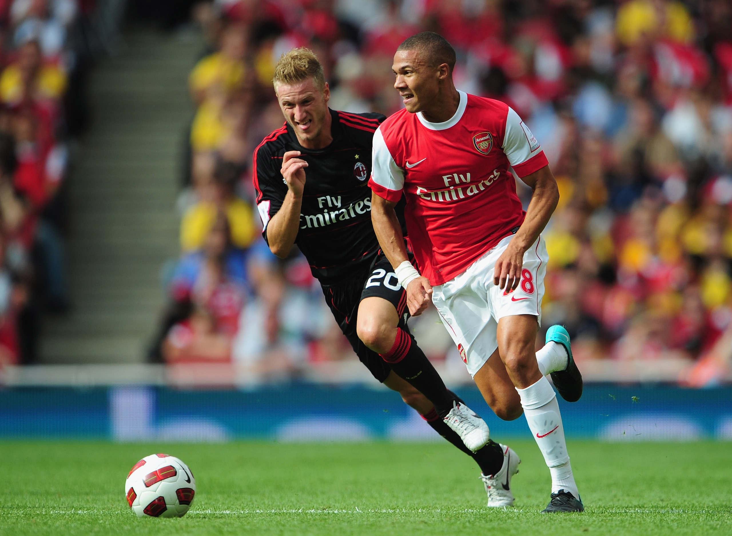 LONDON, ENGLAND - JULY 31:  Kieran Gibbs of Arsenal is chased by Ignazio Abate of AC Milan during the Emirates Cup match between Arsenal and AC Milan at Emirates Stadium on July 31, 2010 in London, England.  (Photo by Mike Hewitt/Getty Images)
