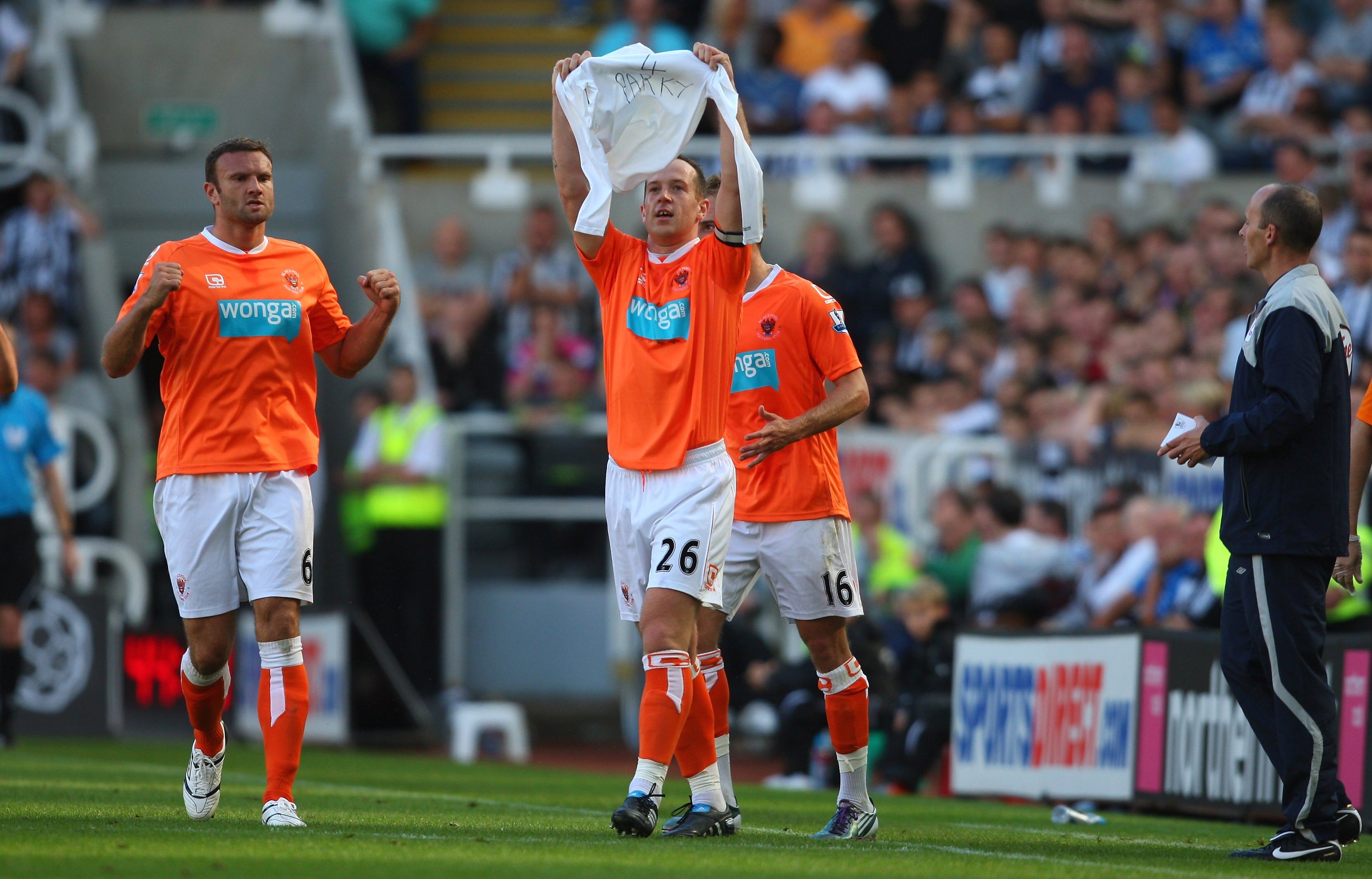 NEWCASTLE UPON TYNE, ENGLAND - SEPTEMBER 11: Blackpool player Charlie Adam celebrates after scoring during the Barclays Premier League match between Newcastle United and Blackpool at St James' Park on September 11, 2010 in Newcastle upon Tyne, England. NEWCASTLE UPON TYNE, ENGLAND - SEPTEMBER 11: Blackpool player Charlie Adam celebrates after scoring during the Barclays Premier League match between Newcastle United and Blackpool at St James' Park on September 11, 2010 in Newcastle upon Tyne, England.