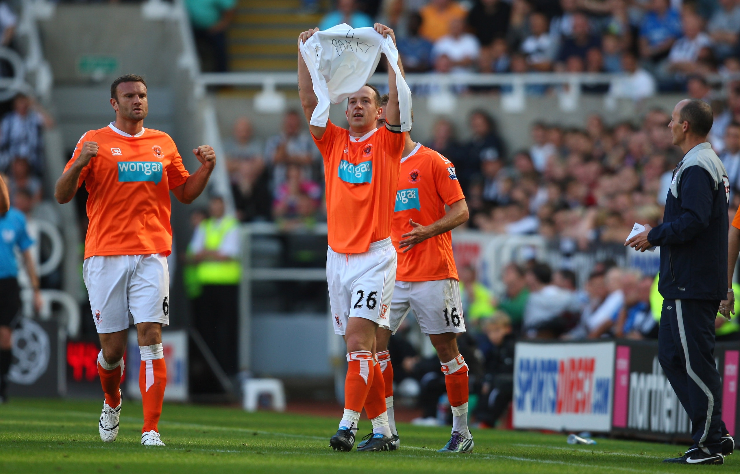 NEWCASTLE UPON TYNE, ENGLAND - SEPTEMBER 11: Blackpool player Charlie Adam celebrates after scoring during the Barclays Premier League match between Newcastle United and Blackpool at St James' Park on September 11, 2010 in Newcastle upon Tyne, England. NEWCASTLE UPON TYNE, ENGLAND - SEPTEMBER 11: Blackpool player Charlie Adam celebrates after scoring during the Barclays Premier League match between Newcastle United and Blackpool at St James' Park on September 11, 2010 in Newcastle upon Tyne, England.