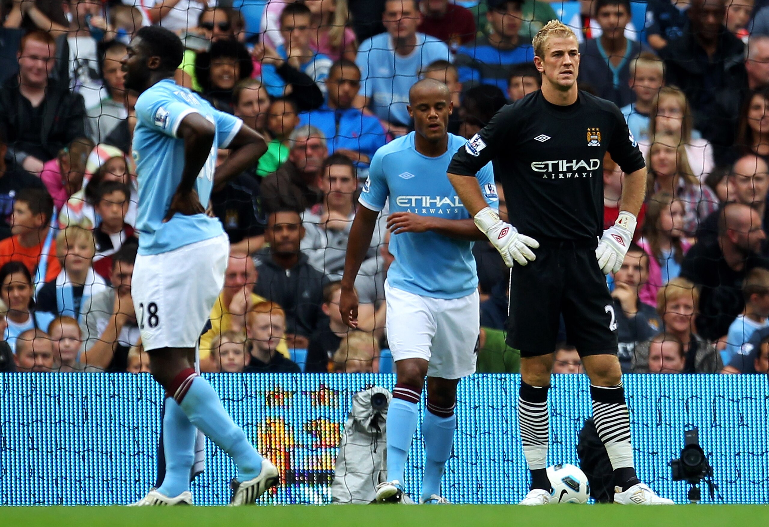 MANCHESTER, UNITED KINGDOM - SEPTEMBER 11: Joe Hart and Kolo Toure (L) of Manchester City look dejected after Nikola Kalinic of Blackburn Rovers scored the opening goal during the Barclays Premier League match between Manchester City and Blackburn Rovers MANCHESTER, UNITED KINGDOM - SEPTEMBER 11: Joe Hart and Kolo Toure (L) of Manchester City look dejected after Nikola Kalinic of Blackburn Rovers scored the opening goal during the Barclays Premier League match between Manchester City and Blackburn Rovers