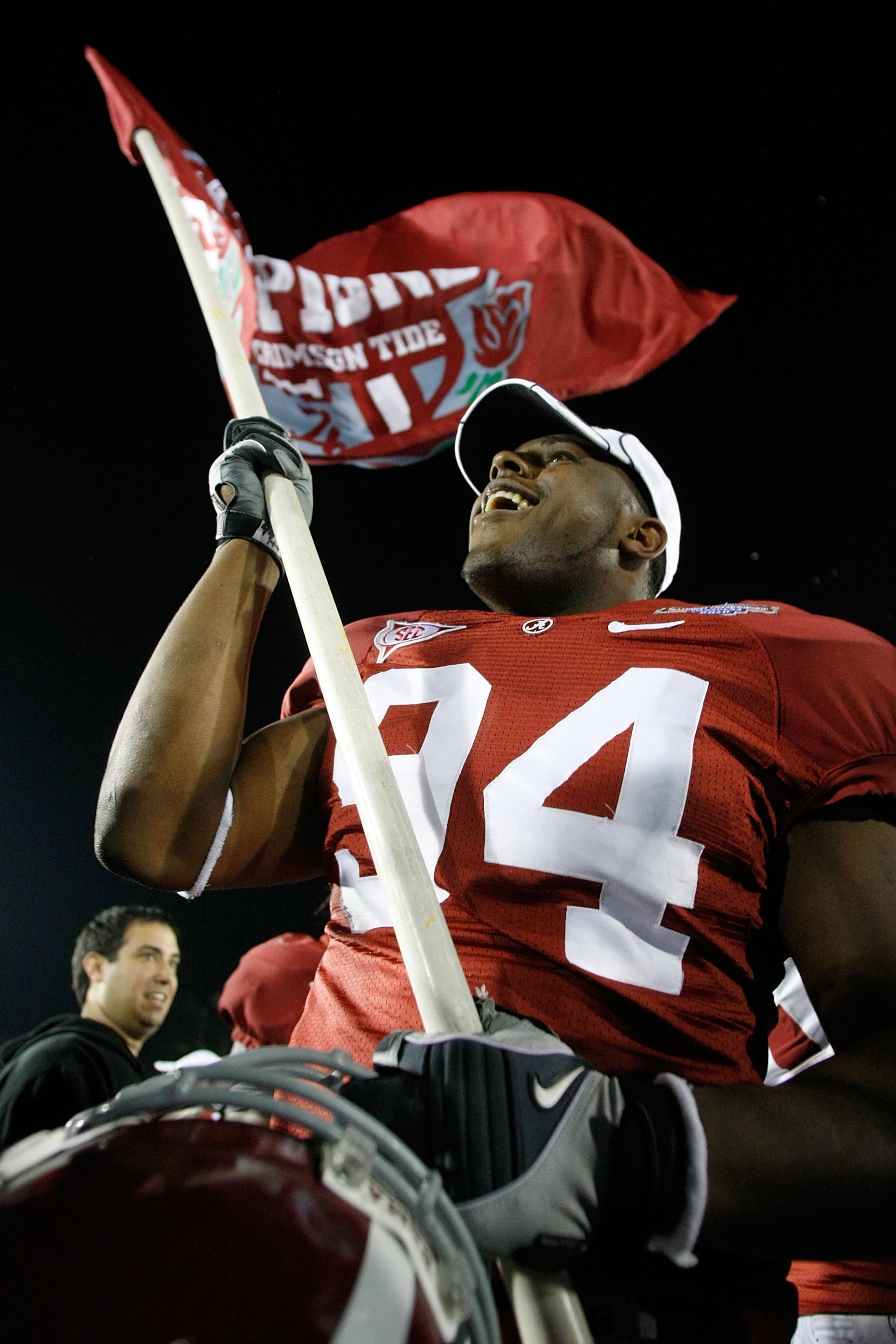 PASADENA, CA - JANUARY 07: Jeremy Shelley #94 of the Alabama Crimson Tide celebrates after winning the Citi BCS National Championship game over the Texas Longhorns at the Rose Bowl on January 7, 2010 in Pasadena, California. The Crimson Tide defeated the PASADENA, CA - JANUARY 07: Jeremy Shelley #94 of the Alabama Crimson Tide celebrates after winning the Citi BCS National Championship game over the Texas Longhorns at the Rose Bowl on January 7, 2010 in Pasadena, California. The Crimson Tide defeated the