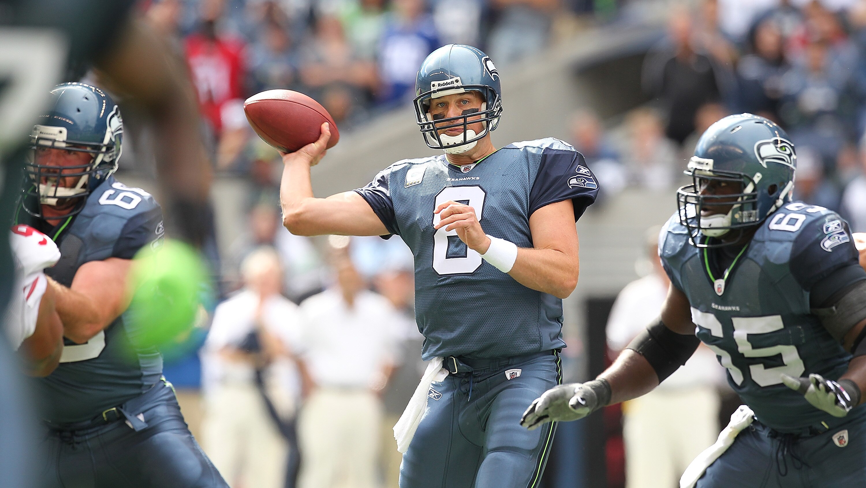 SEATTLE - SEPTEMBER 12:  Quarterback Matt Hasselbeck #8 of the Seattle Seahawks passes during the NFL season opener against the San Francisco 49ers at Qwest Field on September 12, 2010 in Seattle, Washington. The Seahawks defeated the 49ers 31-6. (Photo b