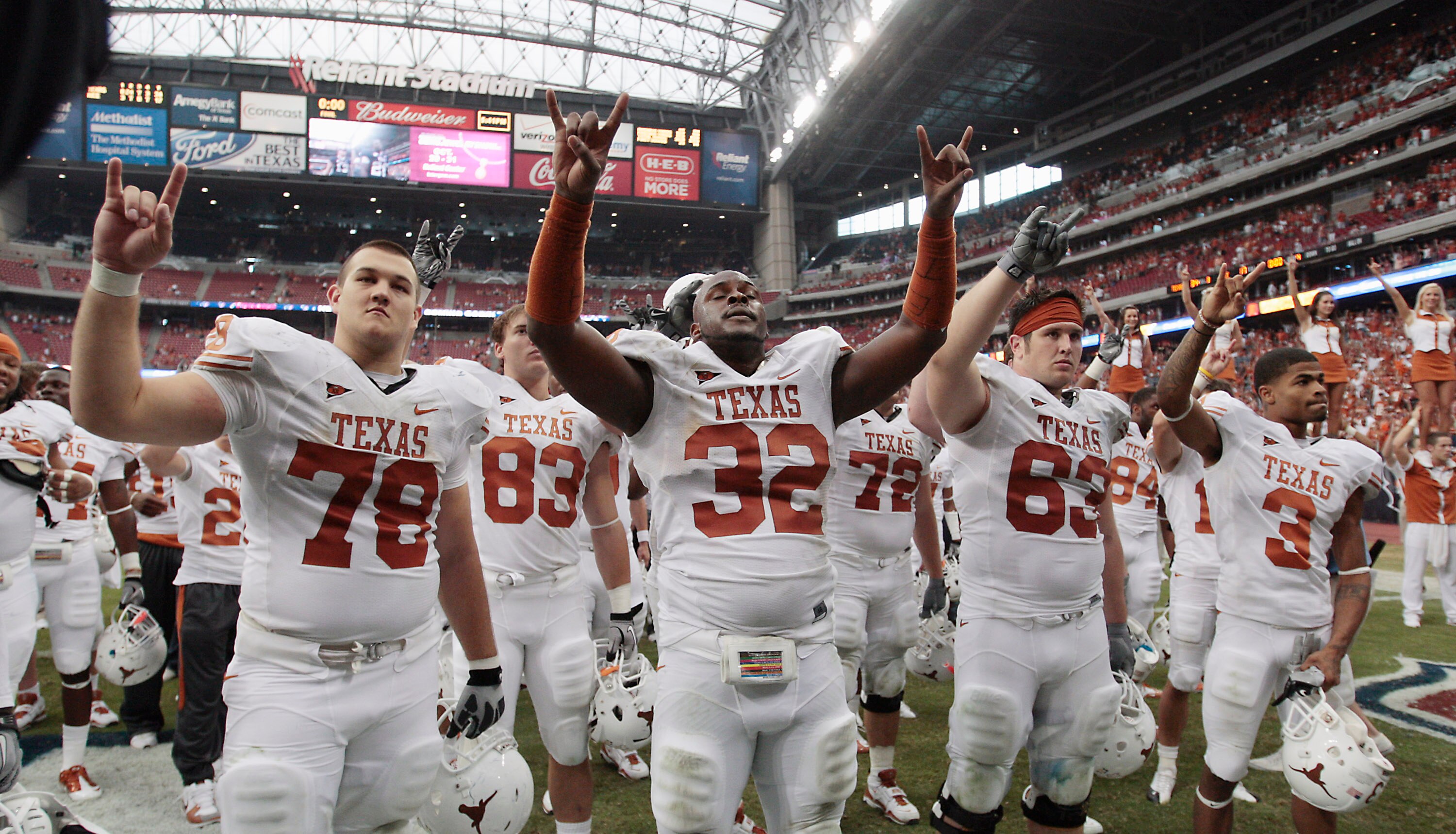 HOUSTON - SEPTEMBER 04:  Texas Longhorns David Snow #78, Traylon Shead #32, Greg Smith #83 and DeSean Hales #3 celebrate their 34-17 win over the Rice Owls at Reliant Stadium on September 4, 2010 in Houston, Texas.  (Photo by Bob Levey/Getty Images)