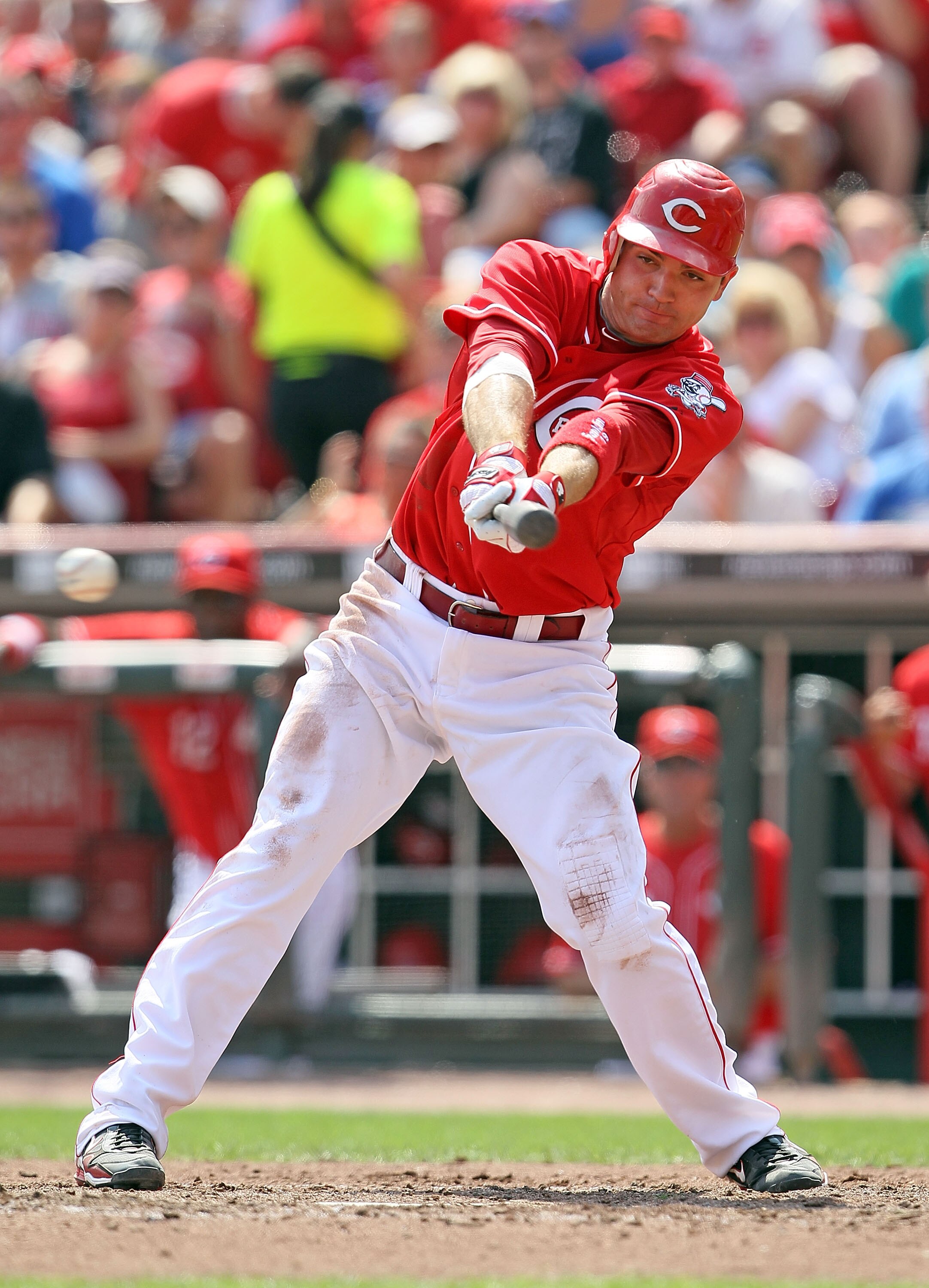 CINCINNATI - AUGUST 29:  Joey Votto #19 of the Cincinnati Reds hits a single during the game against the Chicago Cubs at Great American Ball Park on August 29, 2010 in Cincinnati, Ohio.  (Photo by Andy Lyons/Getty Images)