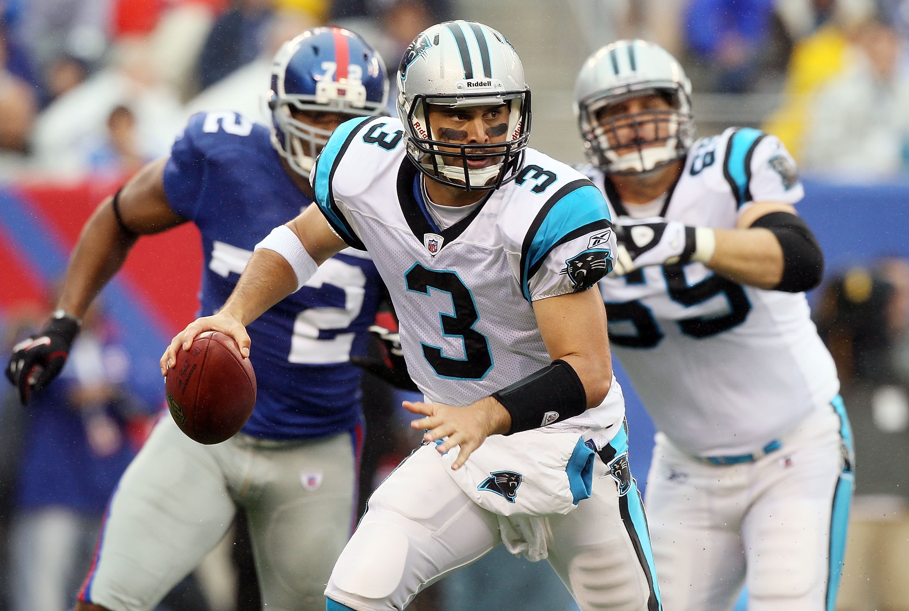 EAST RUTHERFORD, NJ - SEPTEMBER 12:  Matt Moore #3 of the Carolina Panthers scrambles against the New York Giants on September 12, 2010 at the New Meadowlands Stadium in East Rutherford, New Jersey.  (Photo by Jim McIsaac/Getty Images)
